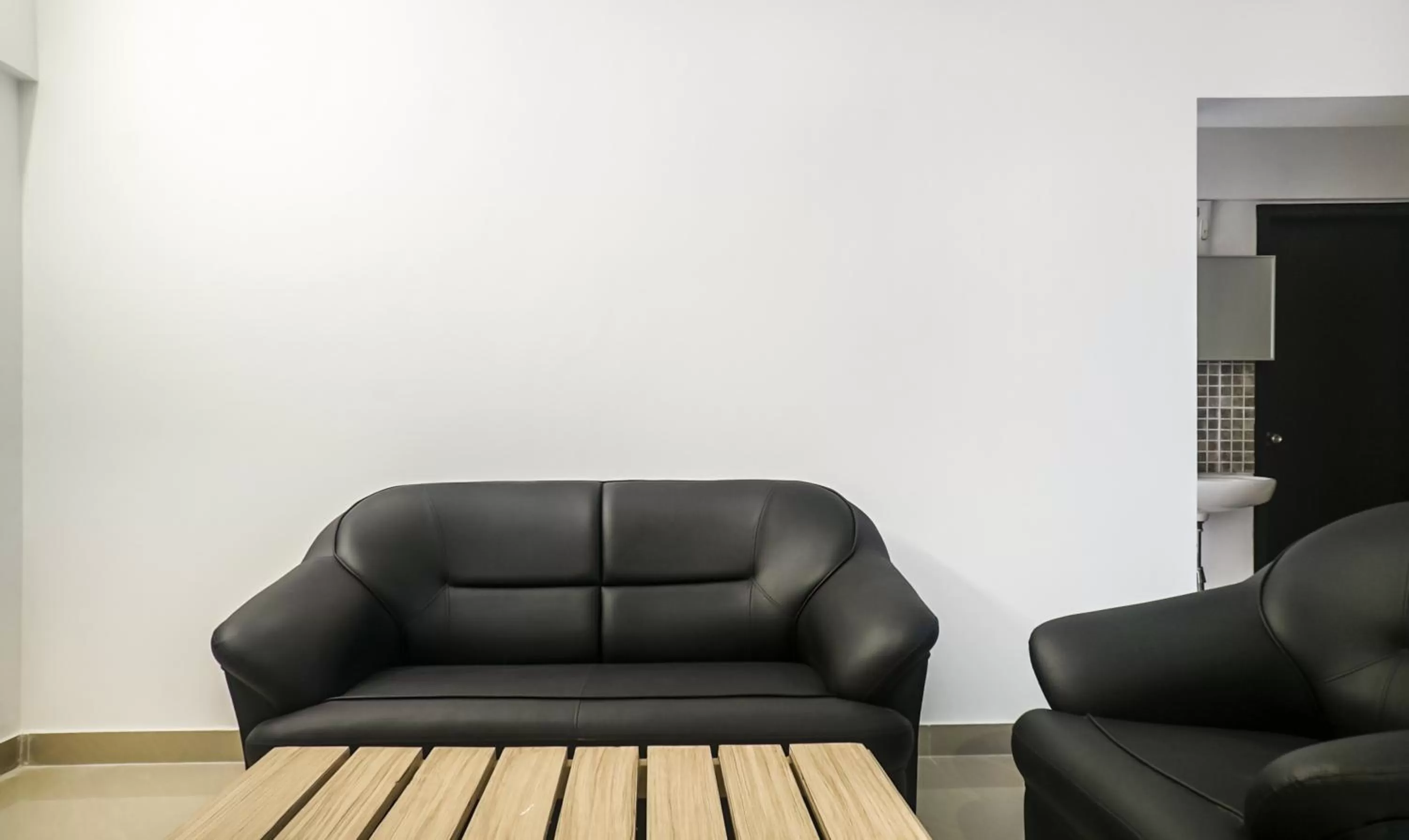 Seating area in Treebo Luxe Suite, Shivaji Nagar