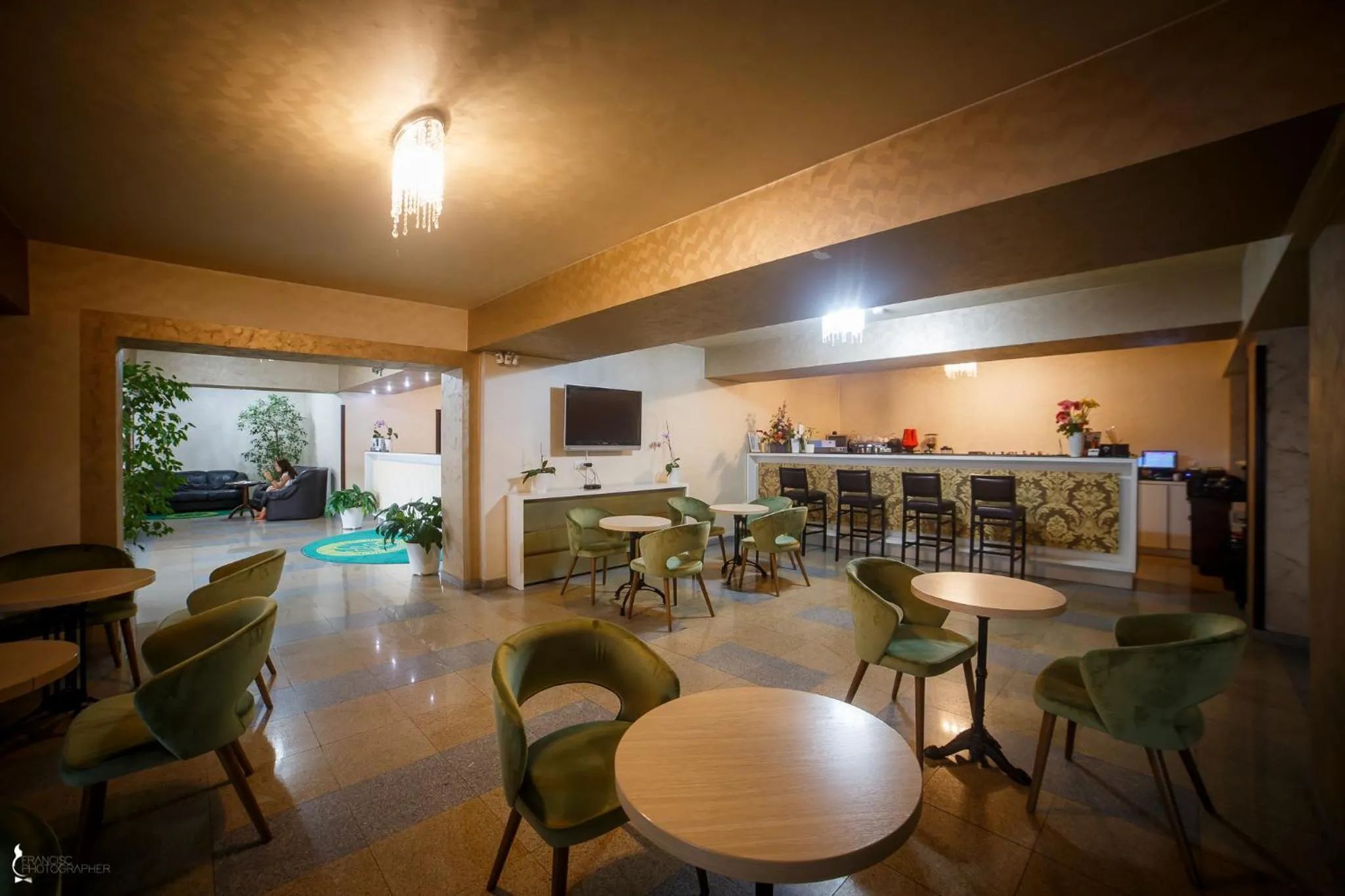 Communal lounge/ TV room in Hotel Ozana