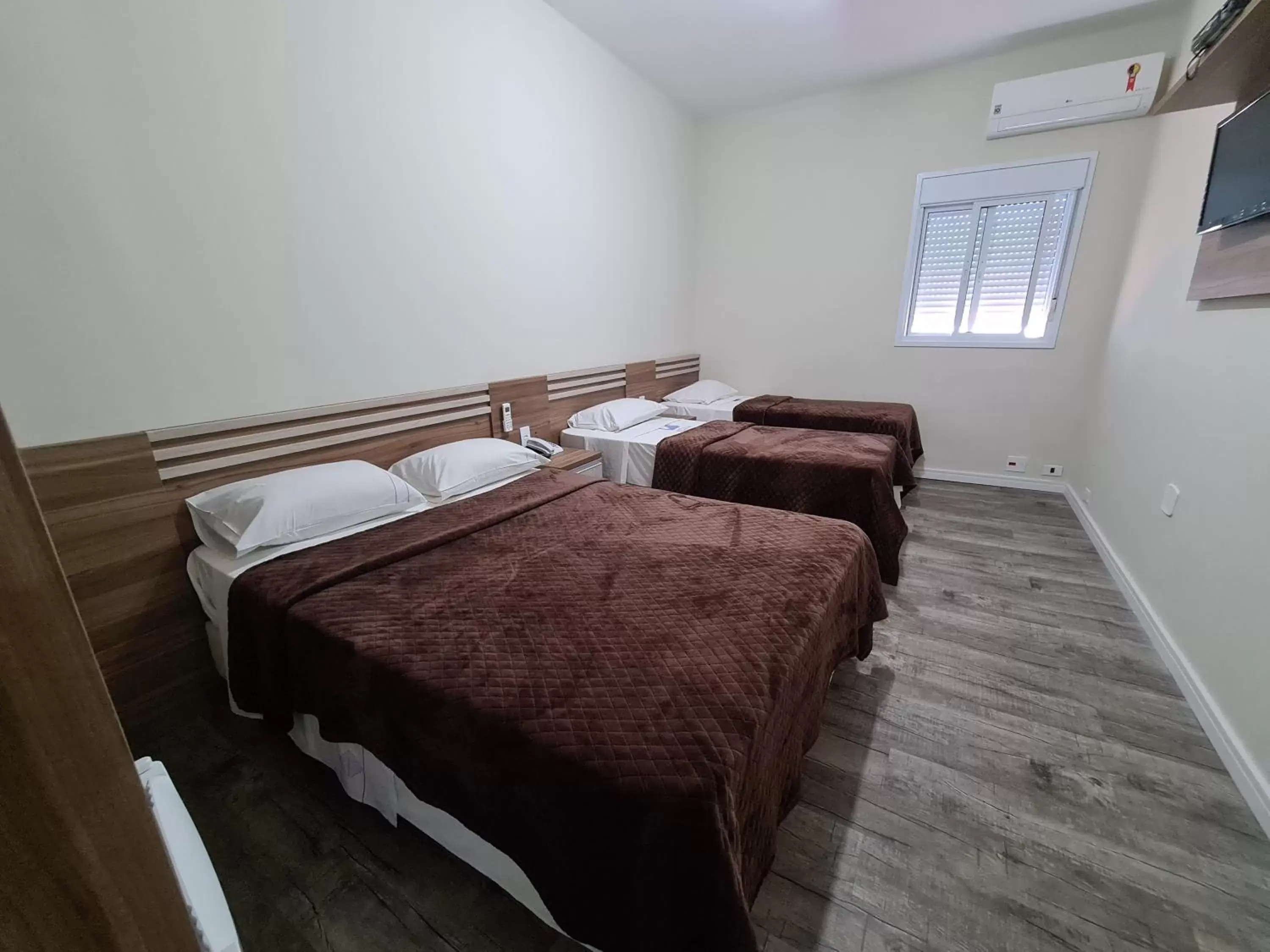 Comfort Quadruple Room in Bella Augusta Hotel Comfort Quadruple Room in Bella Augusta Hotel