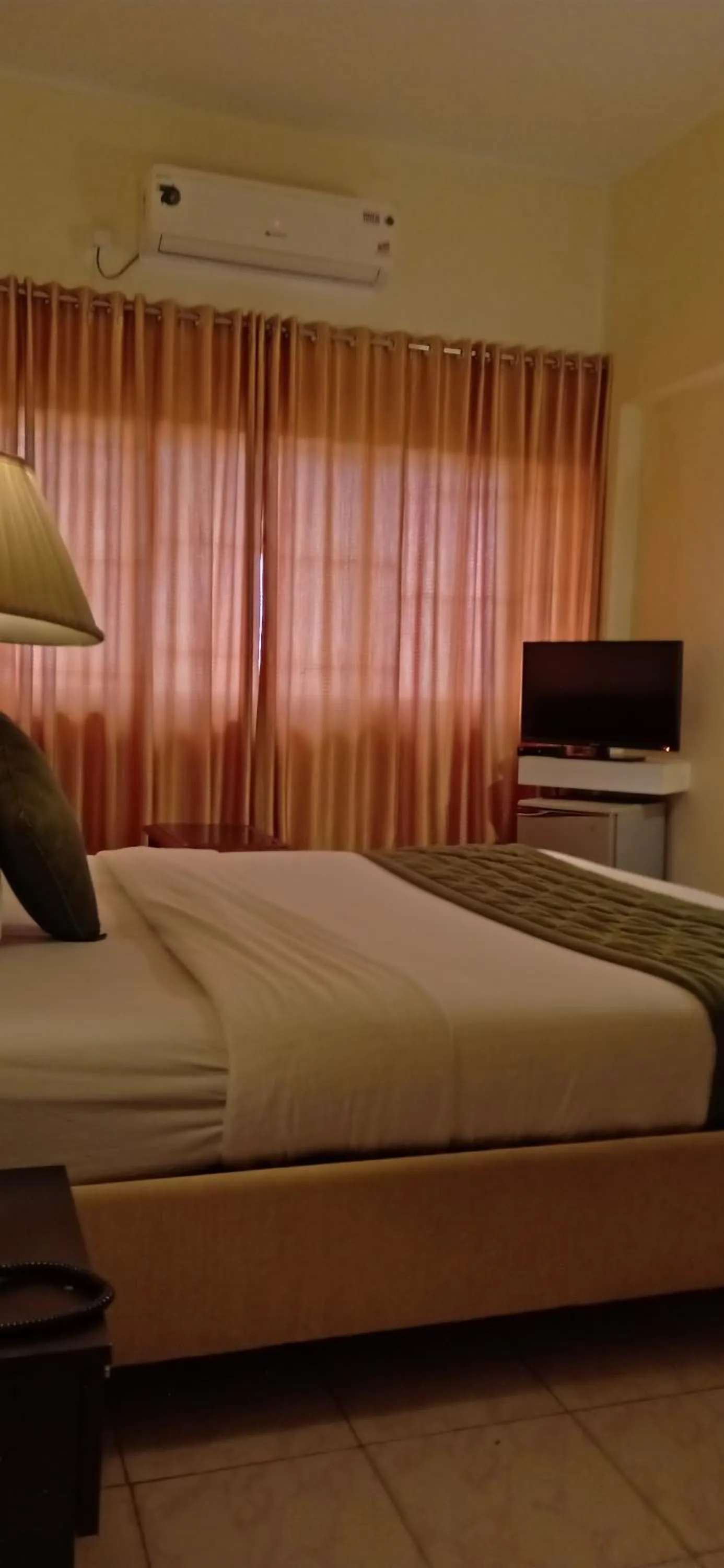 Bed in Hotel Poonja International