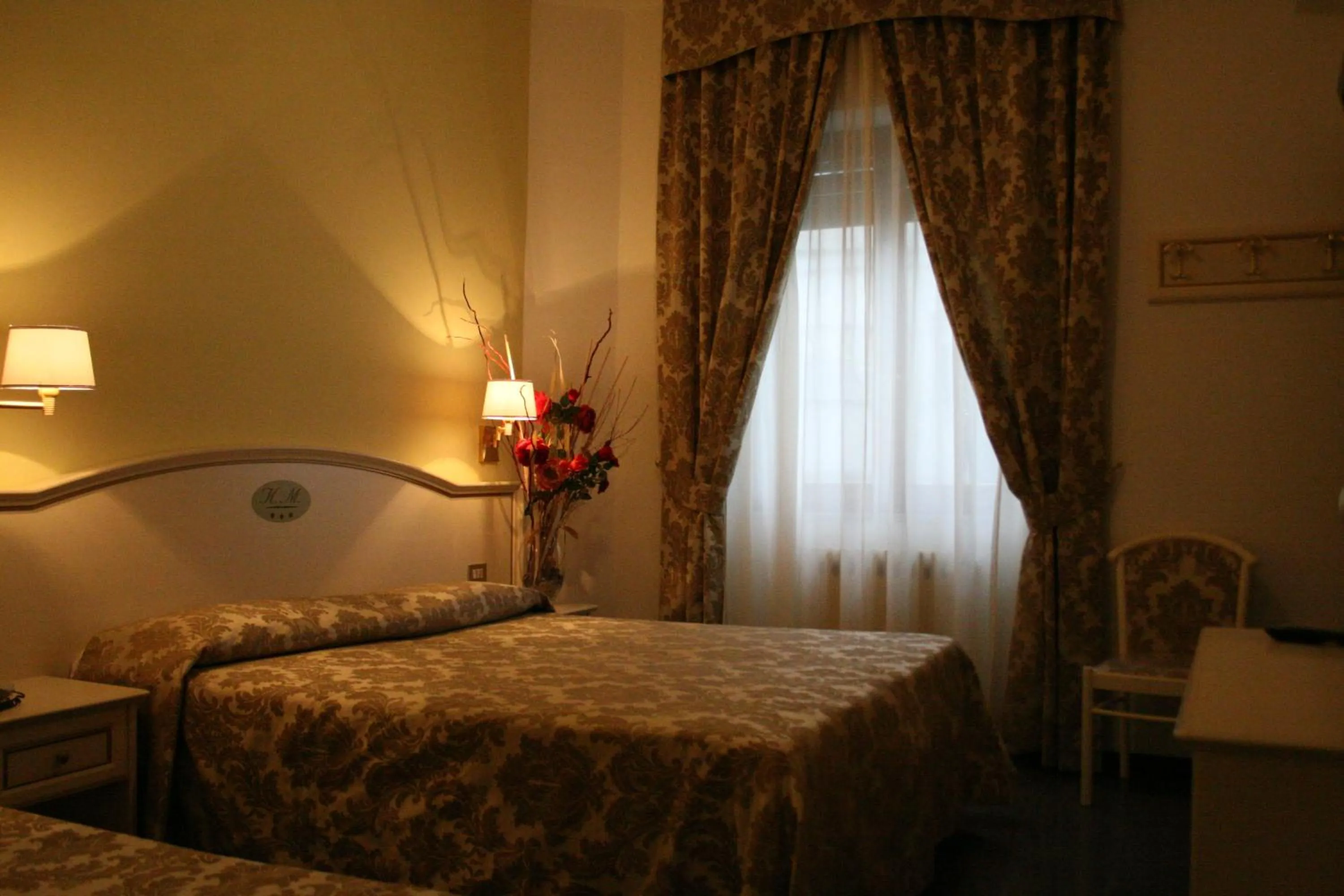 Bed in Hotel La Meridiana
