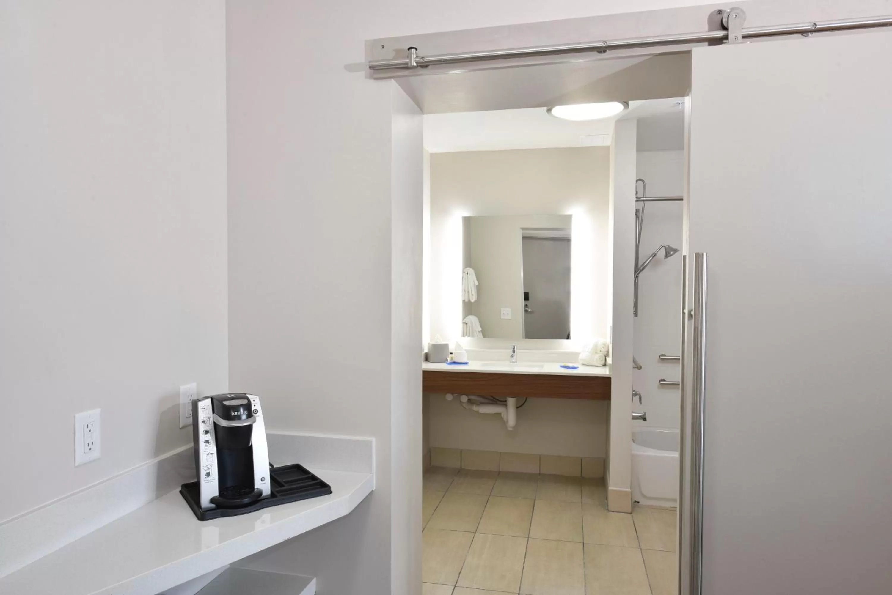 Bathroom in Holiday Inn Express & Suites - Orlando - Southeast by IHG