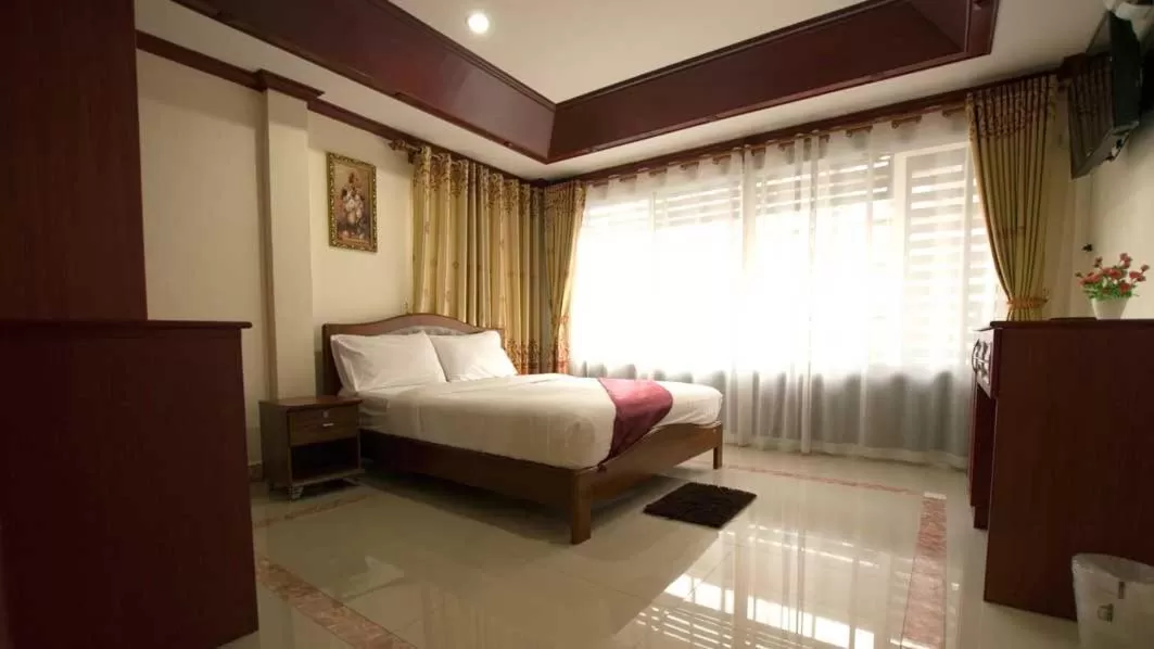 Bed in Bluebird Inn Pattaya