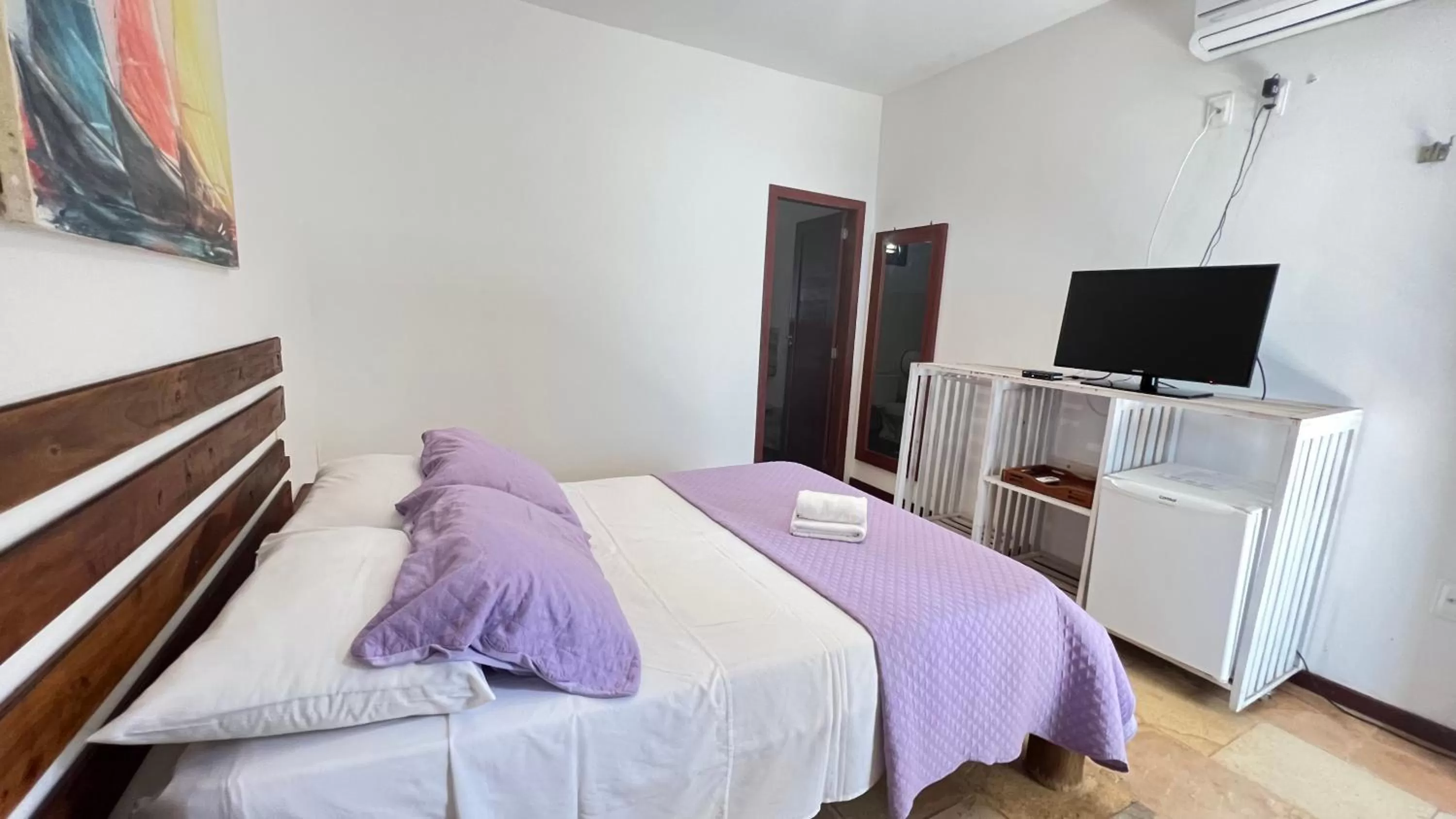 Communal lounge/ TV room in Aki Pousada