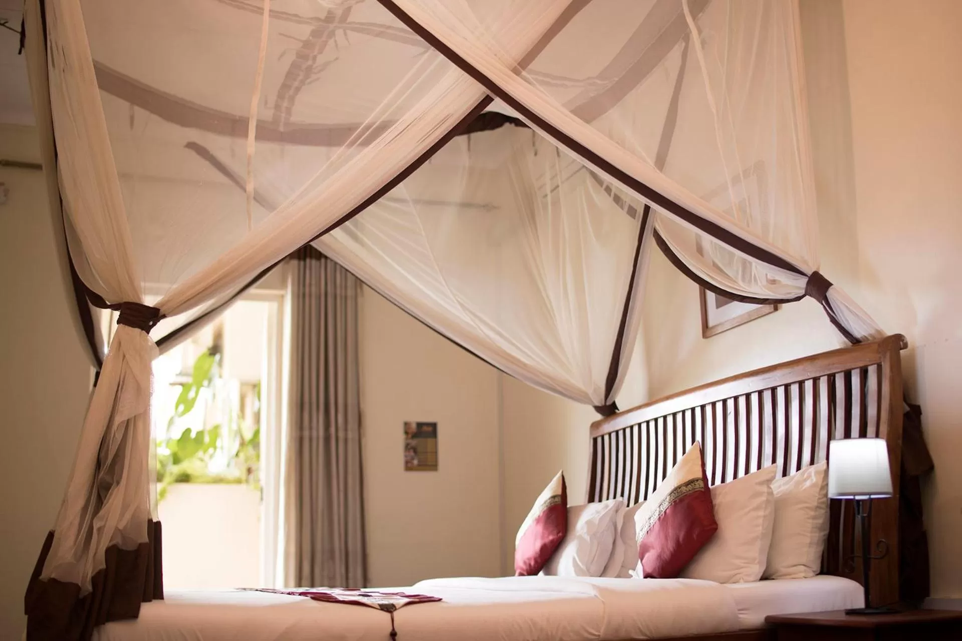 Bed in Entebbe Palm Hotel