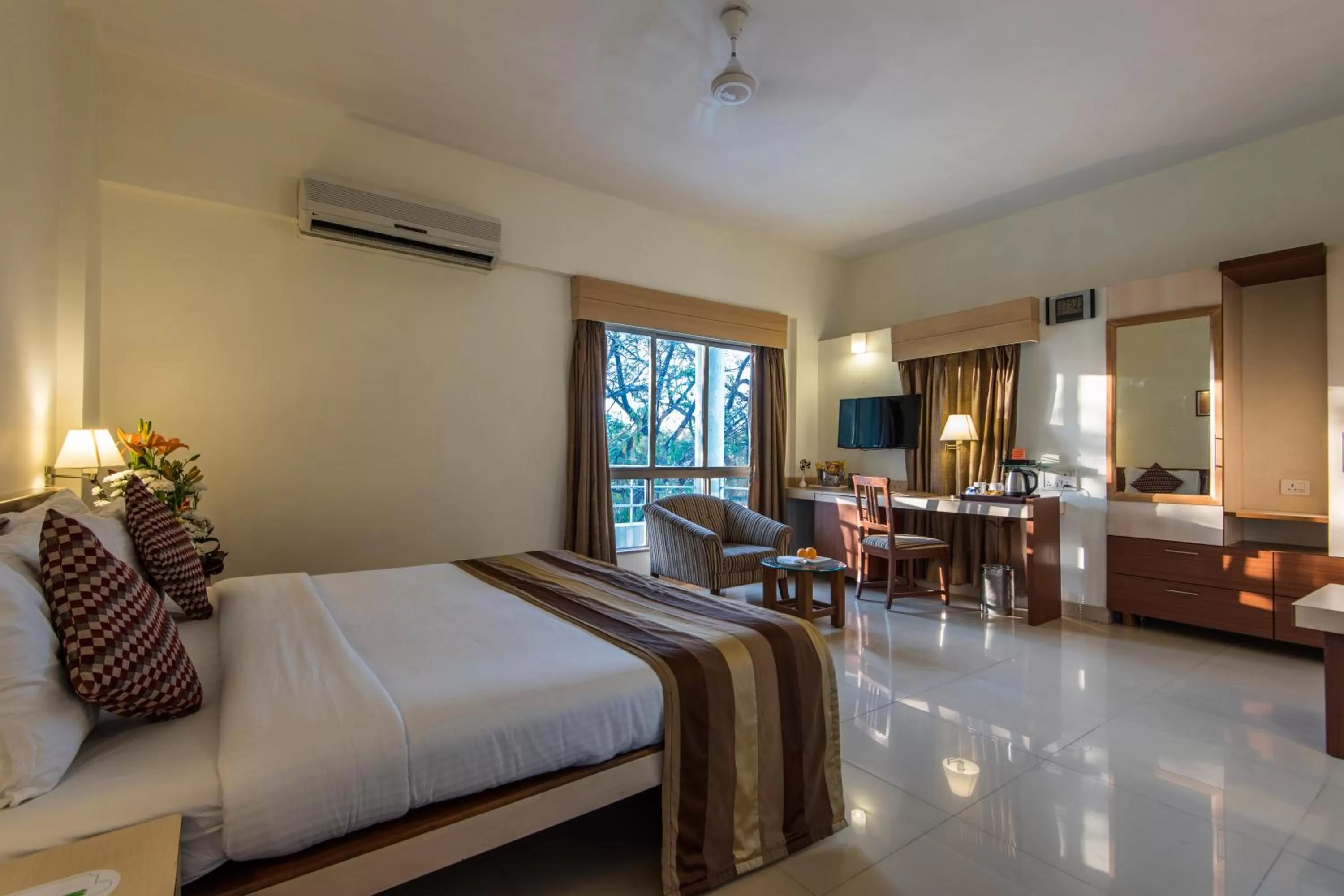 Photo of the whole room, Bed in Hotel Phoenix Koregaon Park
