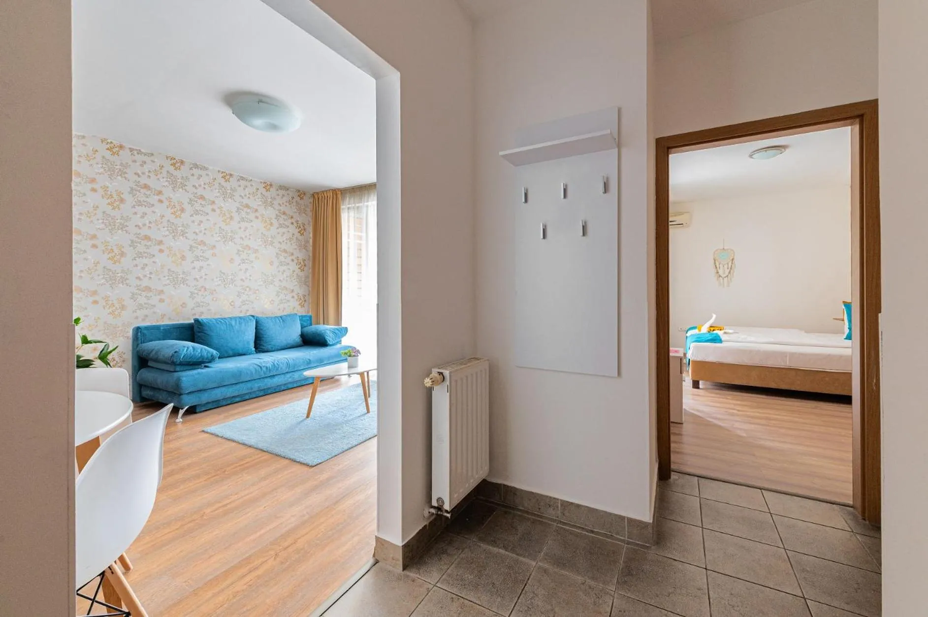 Living room, Bed in Nova Apartments