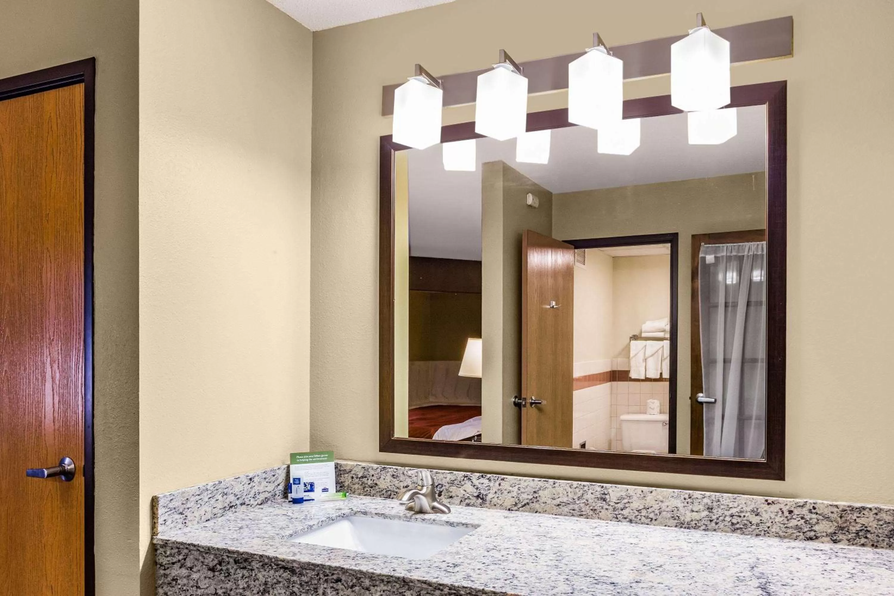 Bathroom in AmericInn by Wyndham Blue Earth