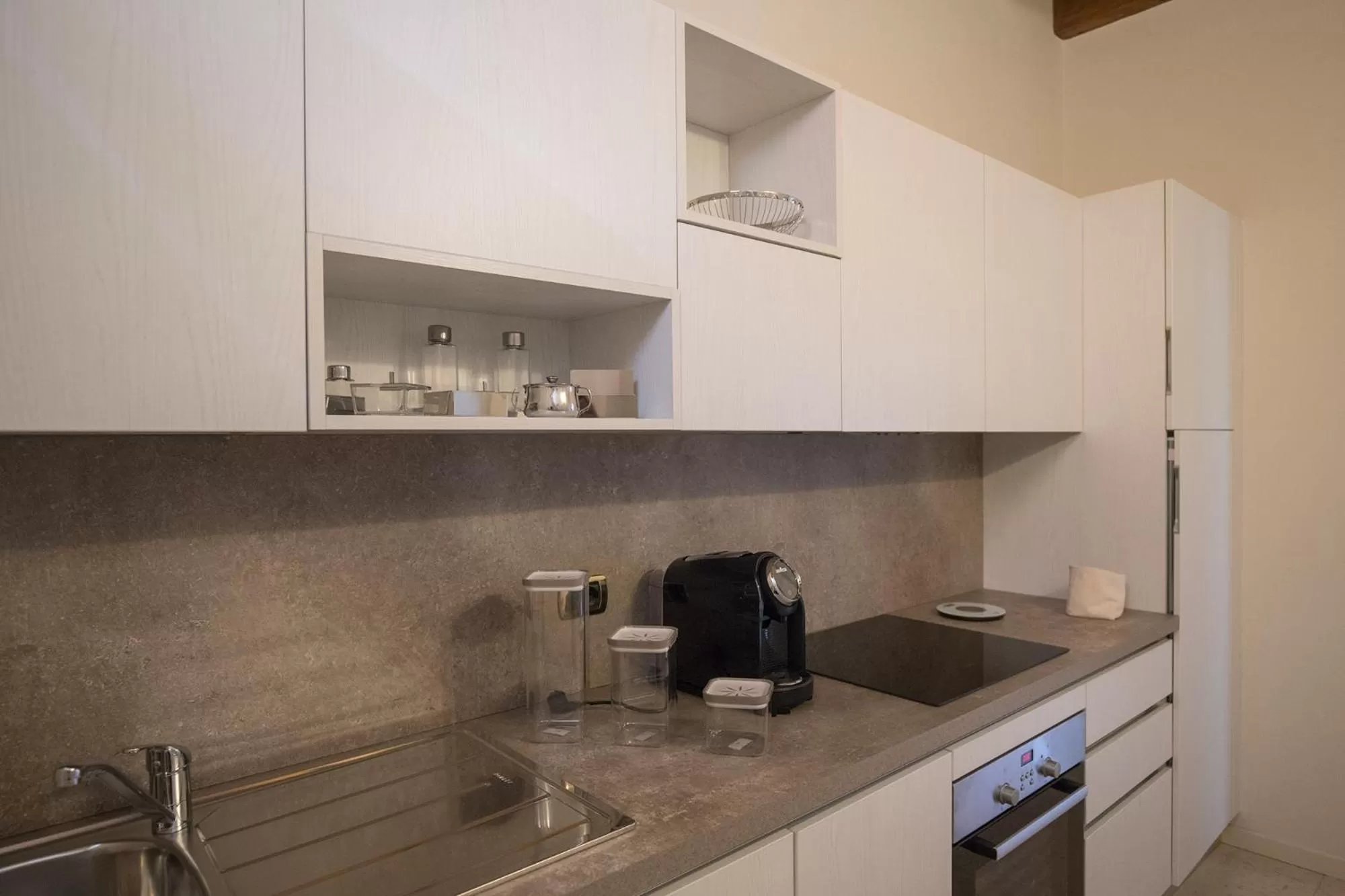 Kitchen or kitchenette in Apartments Golf Bogliaco