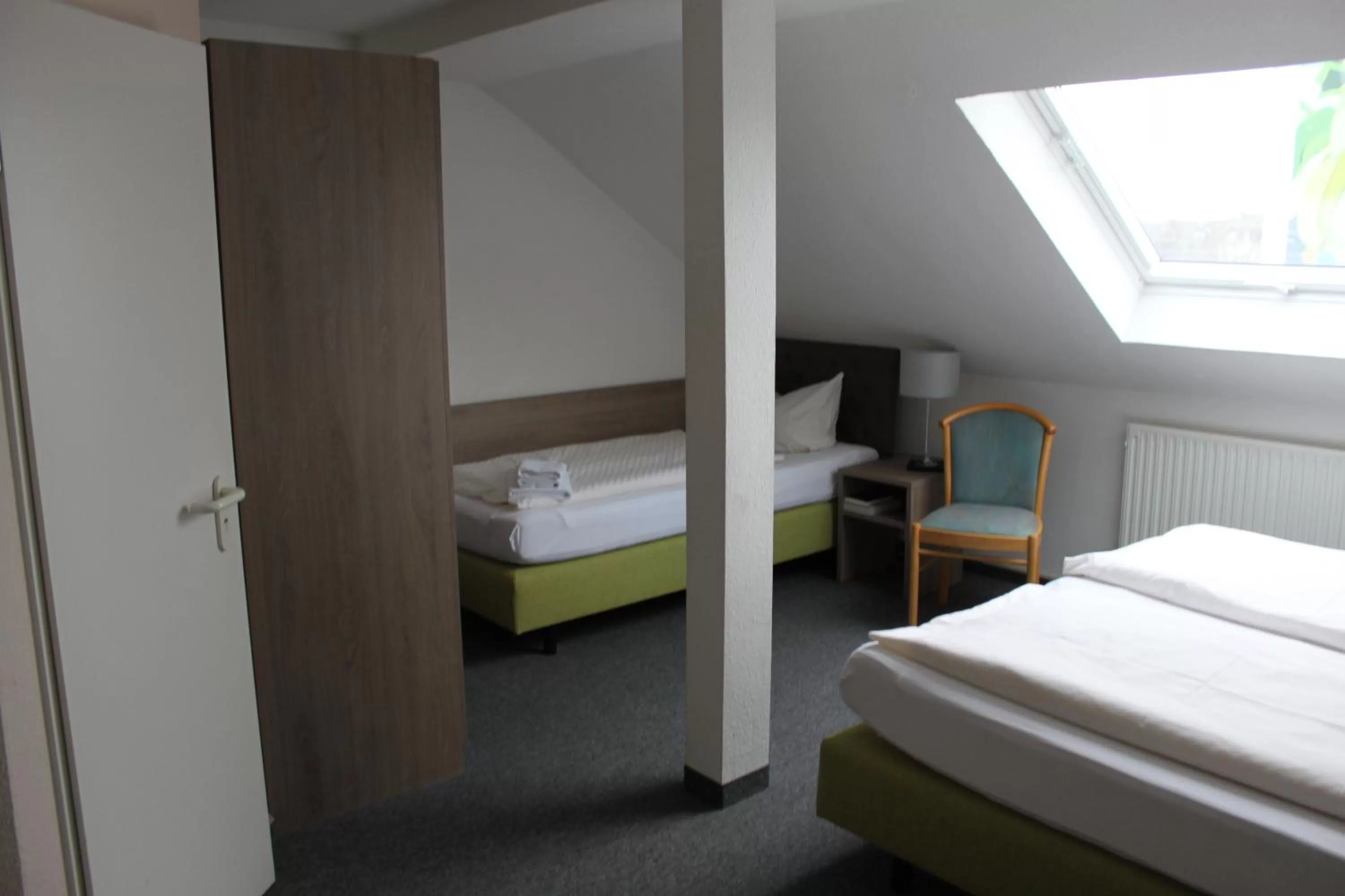 Bed in Hotel Sächsischer Hof