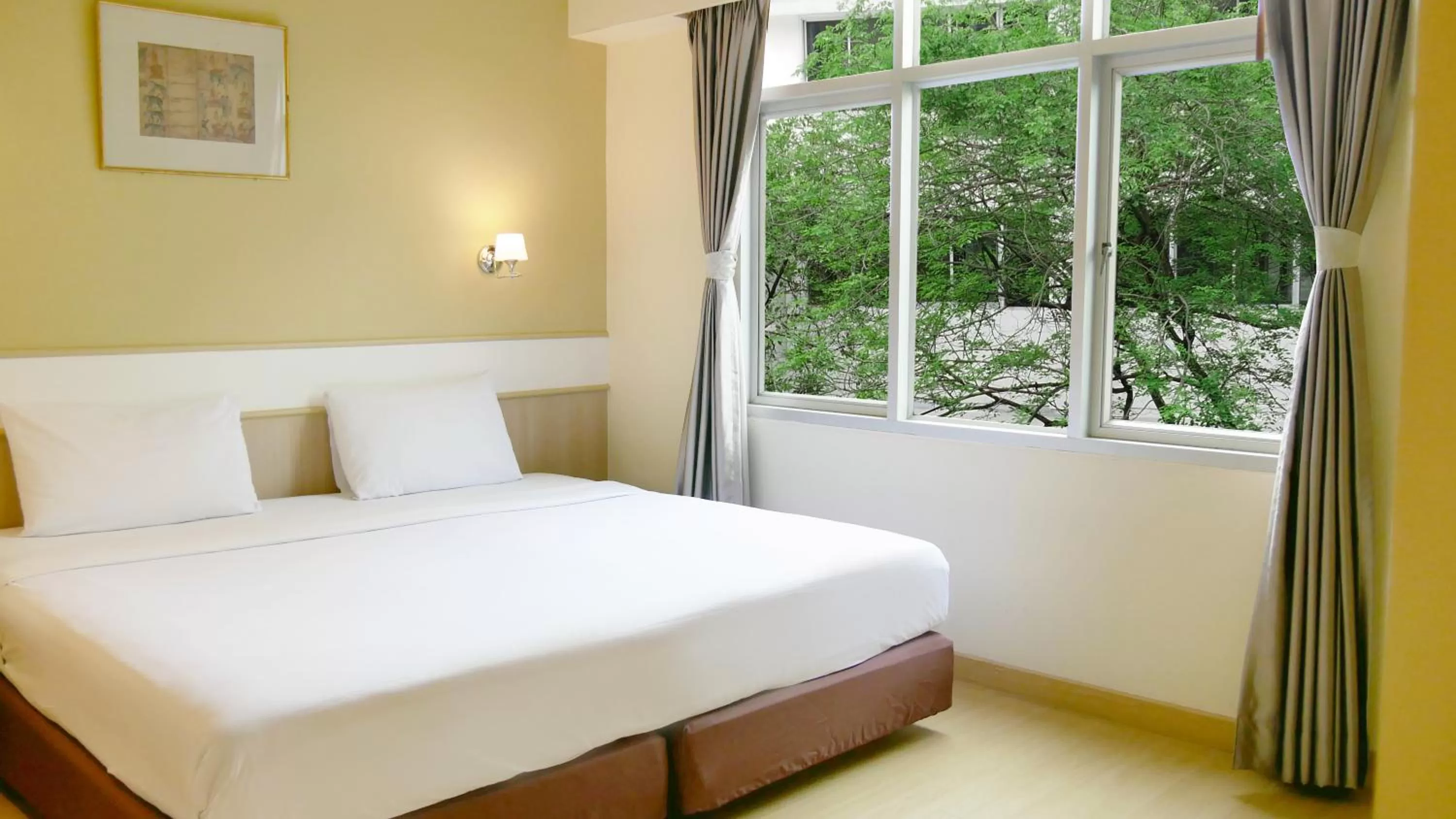 Bed in Trang Hotel Bangkok - SHA Plus