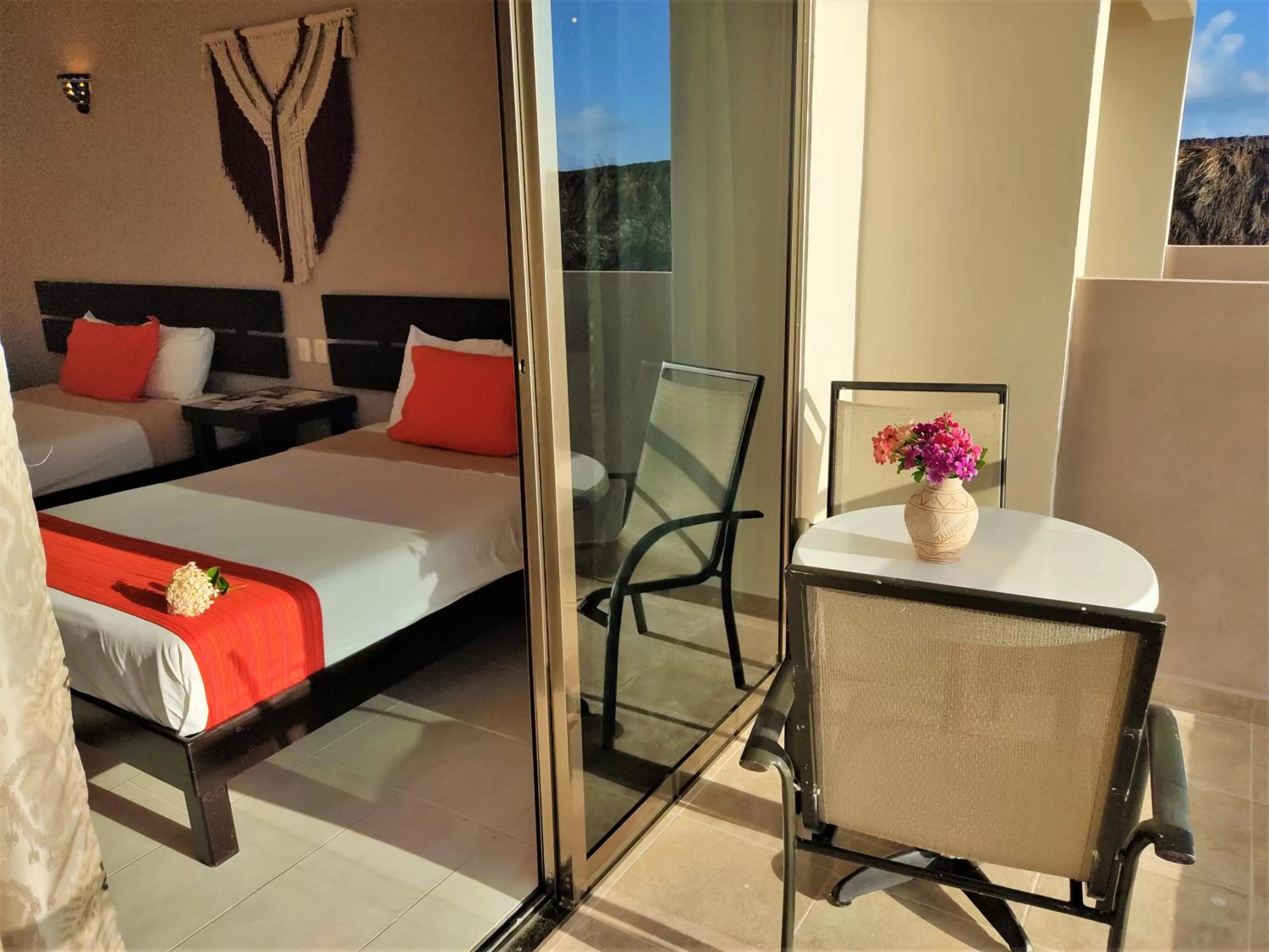 Balcony/Terrace, Bed in Hacienda Morelos Beachfront Hotel