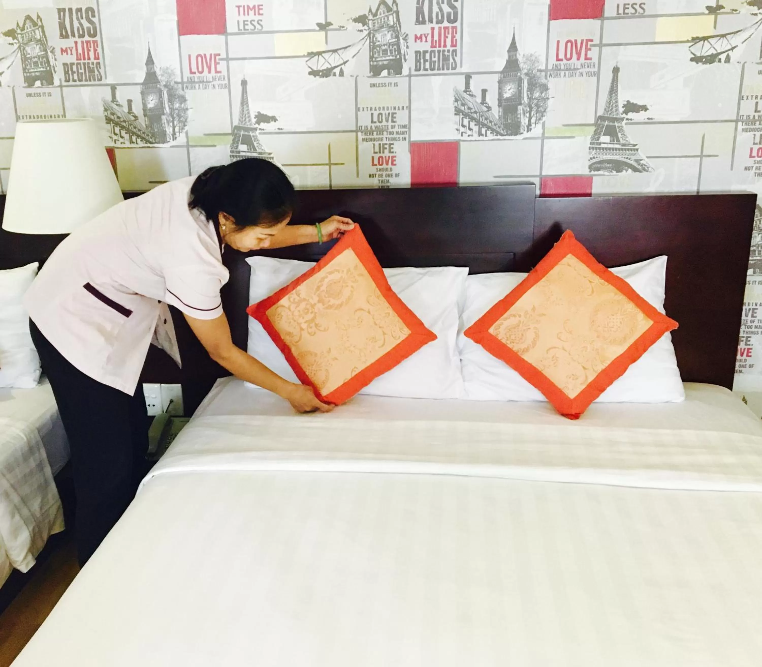 Staff, Bed in Little Brick Saigon Hotel