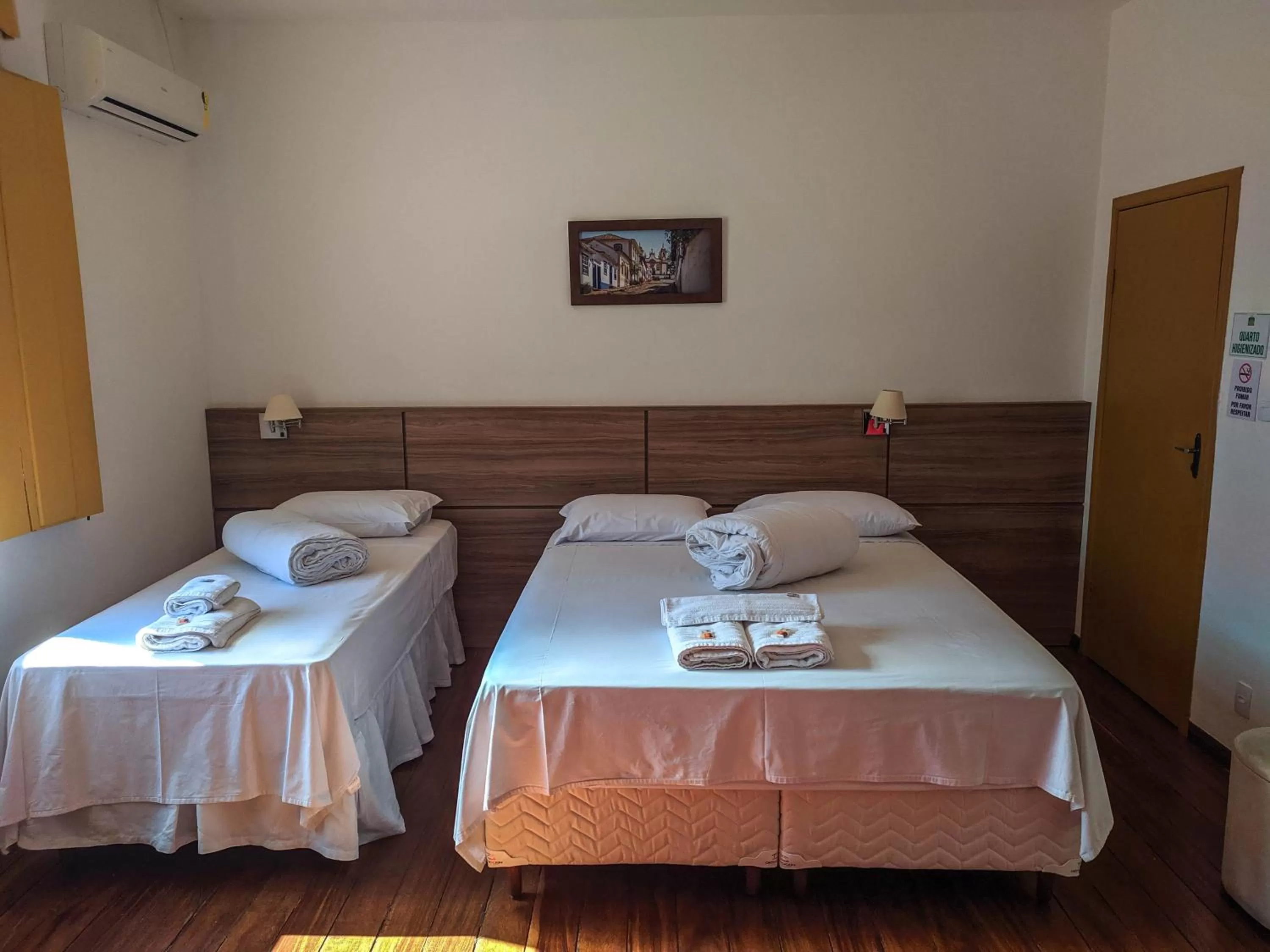 Bed in Pousada o Amanhecer