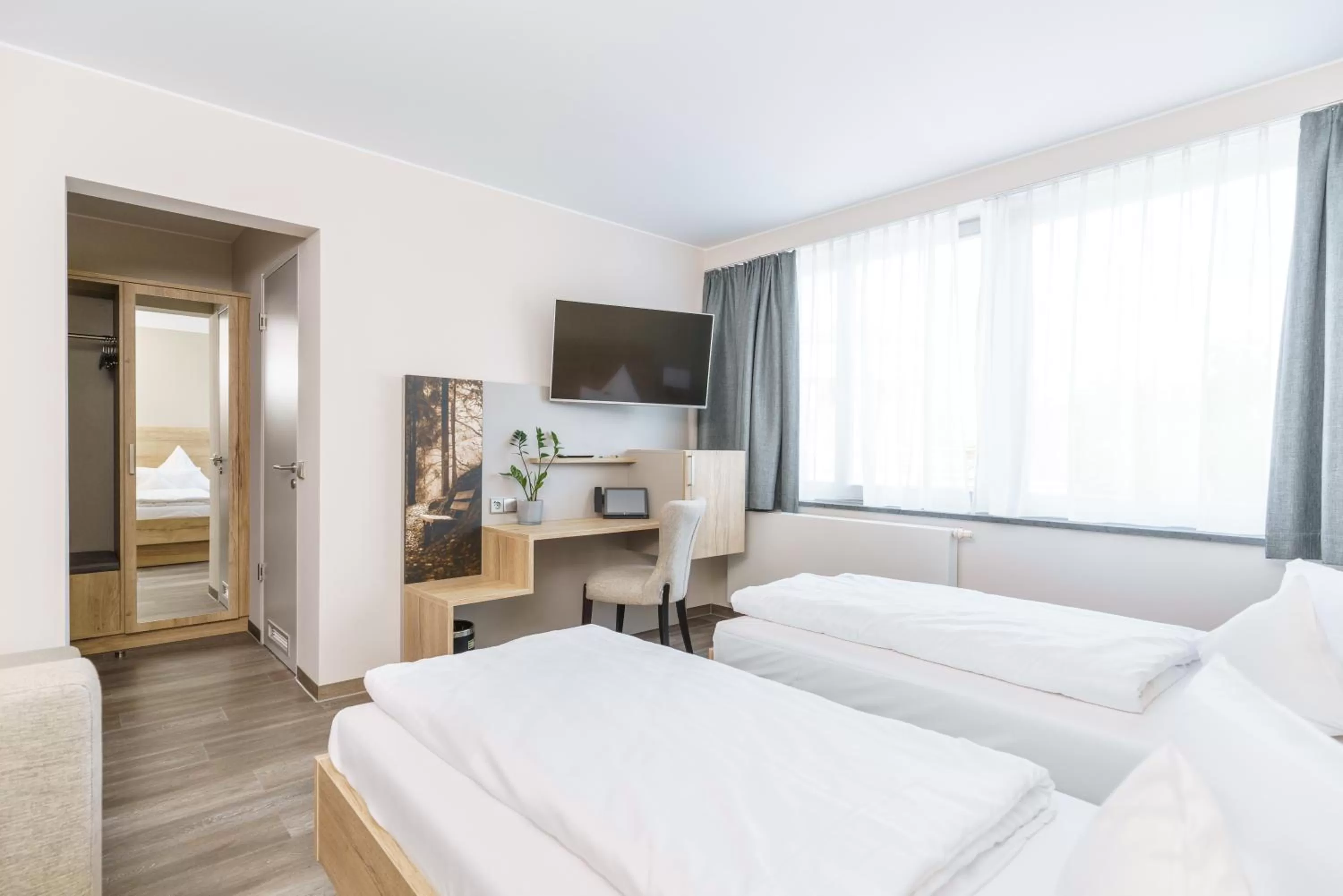 Bed in Hotel Forsthaus Grüna Betreibergesellschaft mbH