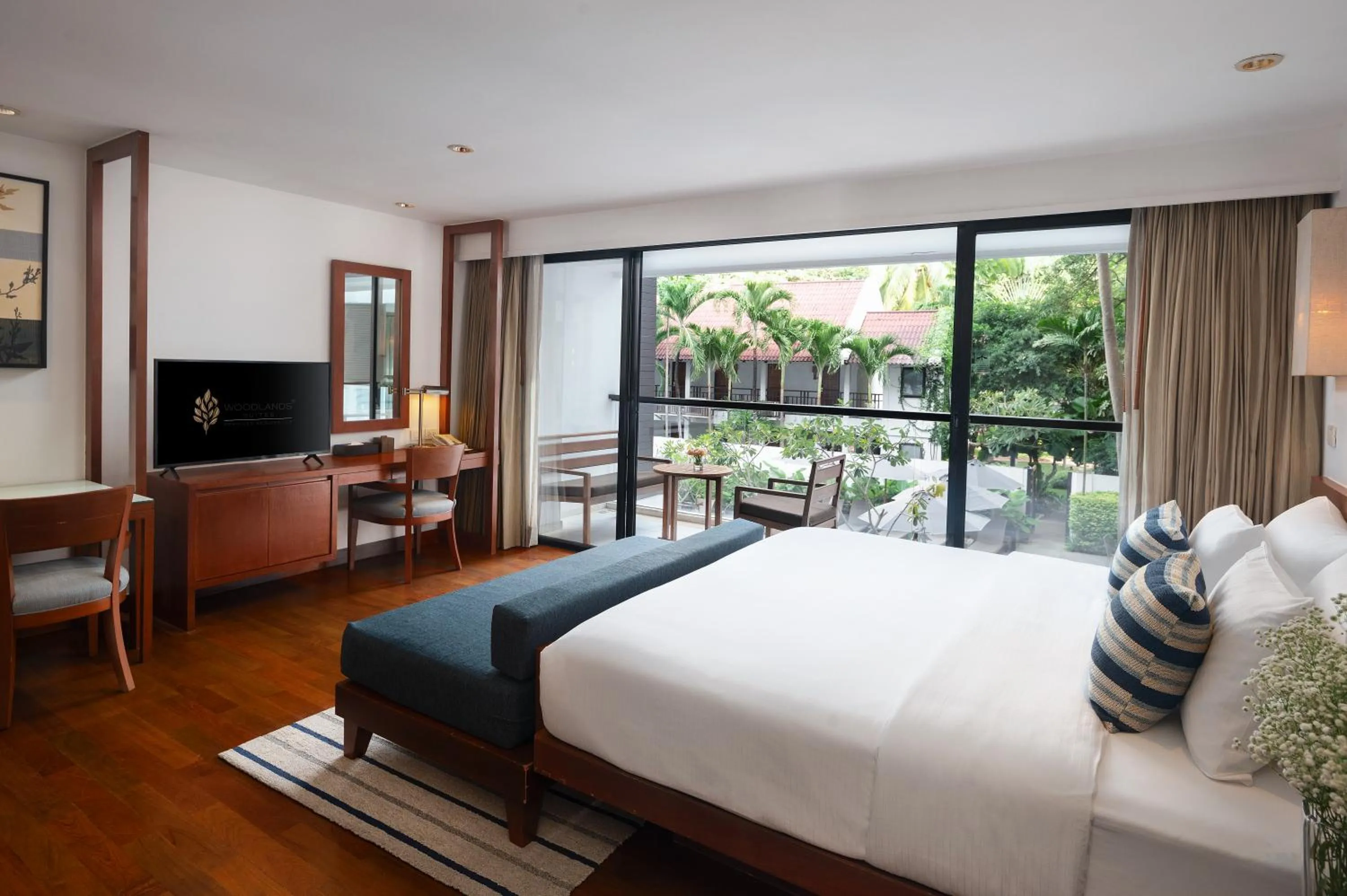 Bed in Woodlands Suites Serviced Residences