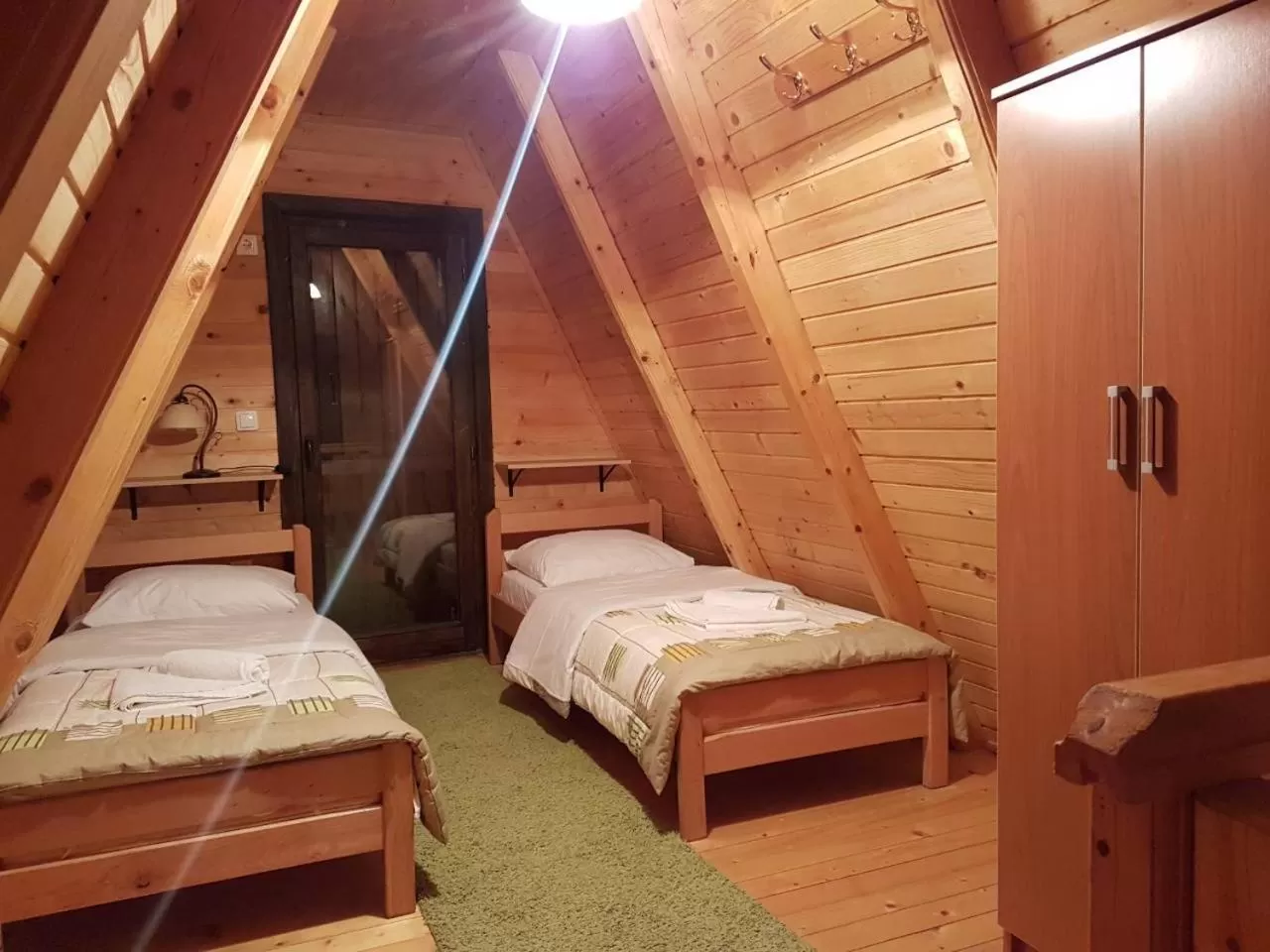 Bed in OSTROG Aparthotel KOLIBA-VLASTNIŠTVO MANASTIRA OSTROG