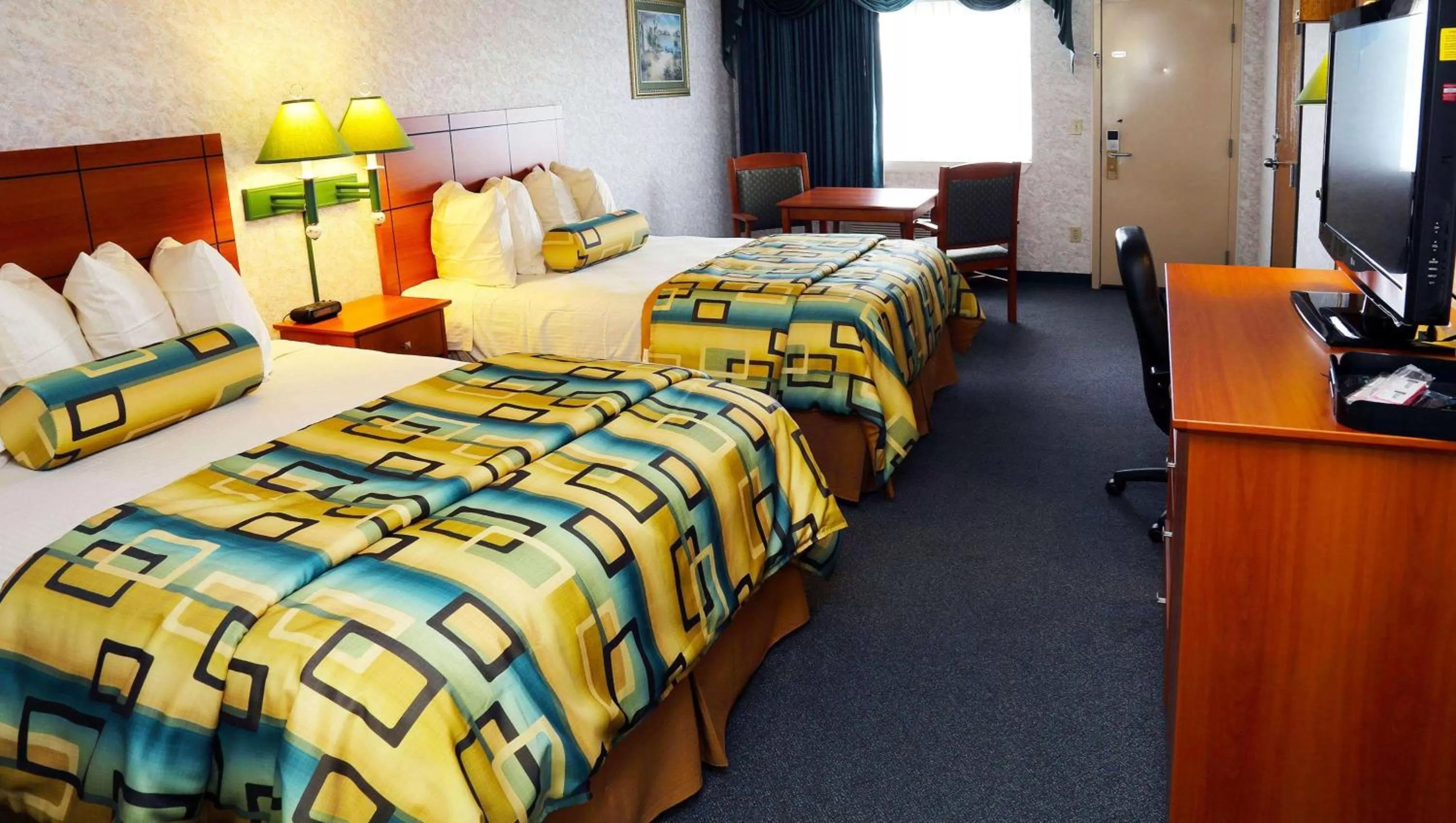 Photo of the whole room, Bed in Magnuson Hotel Howell/Brighton