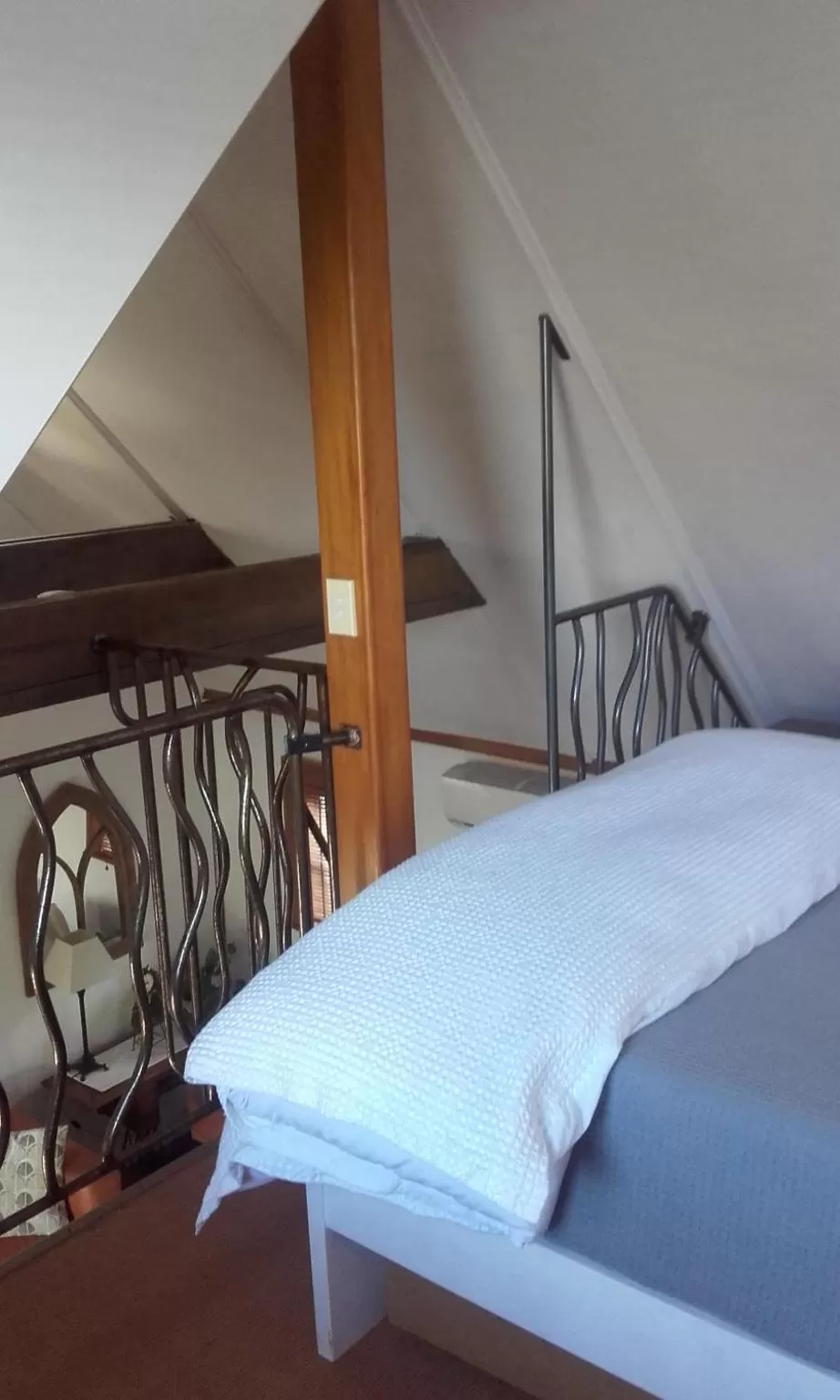 Decorative detail, Bed in Harbour View Cottage