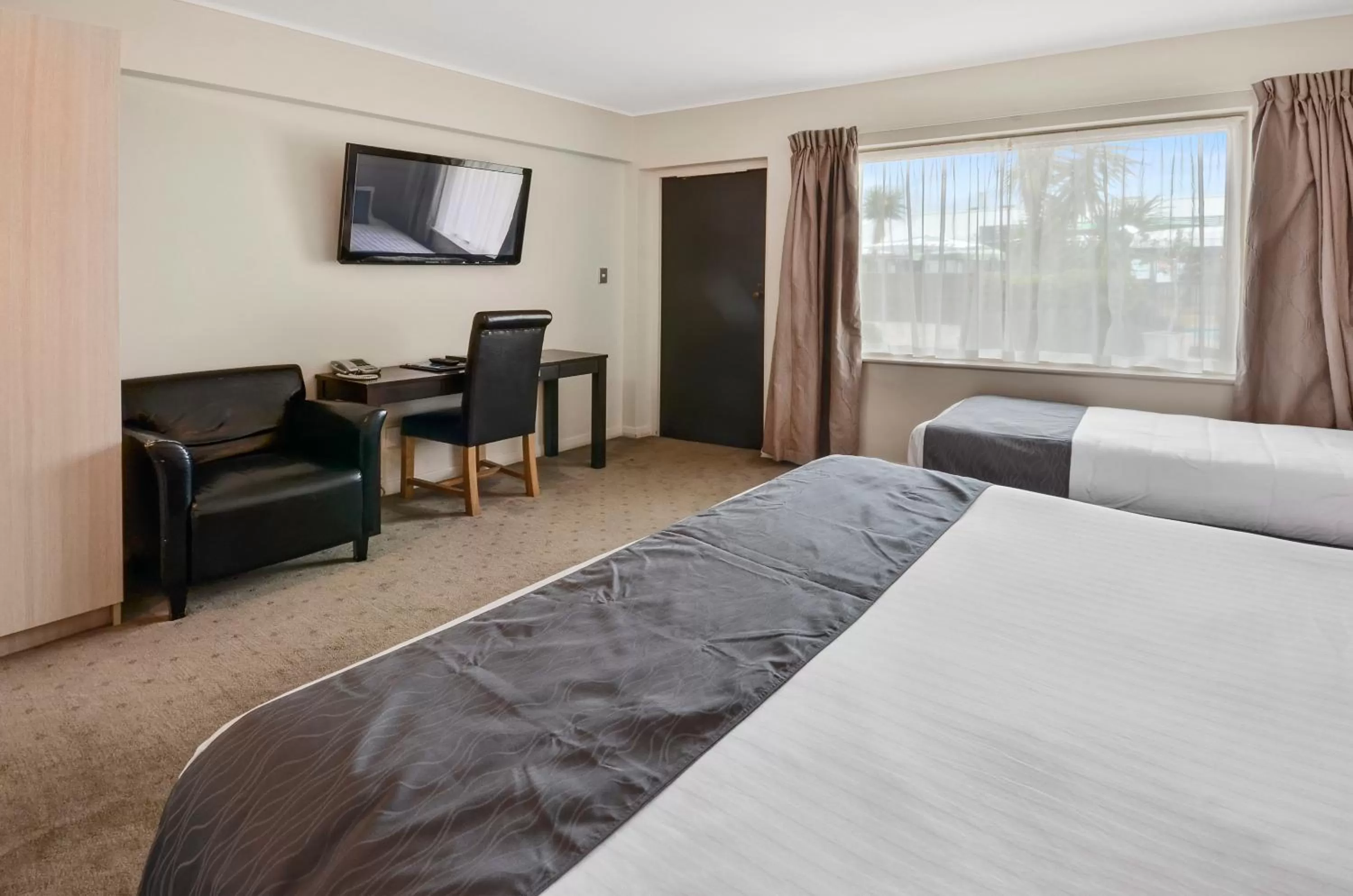 Bed in Poenamo Hotel