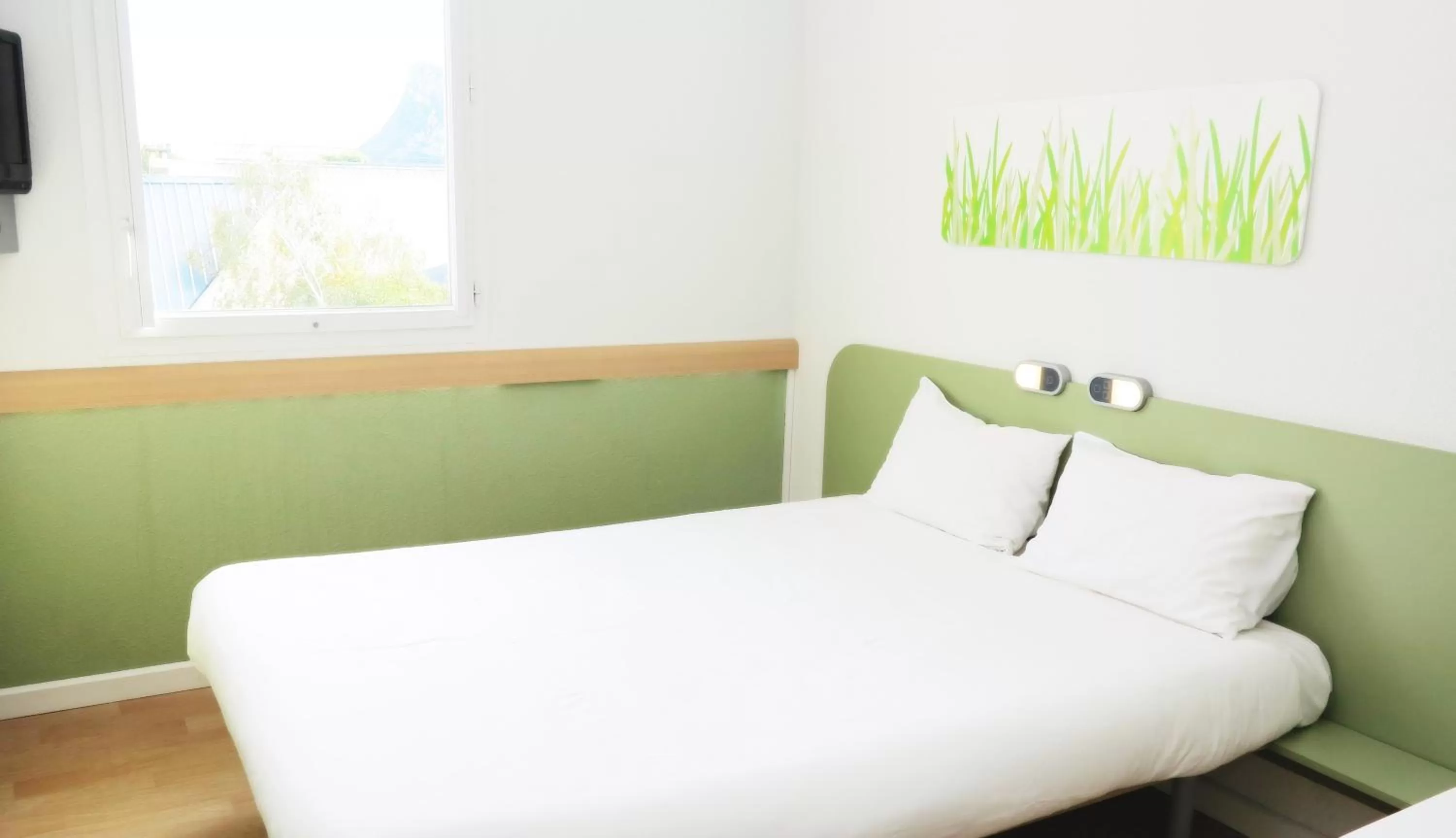 Bed in Ibis Budget Grenoble Sud Seyssins