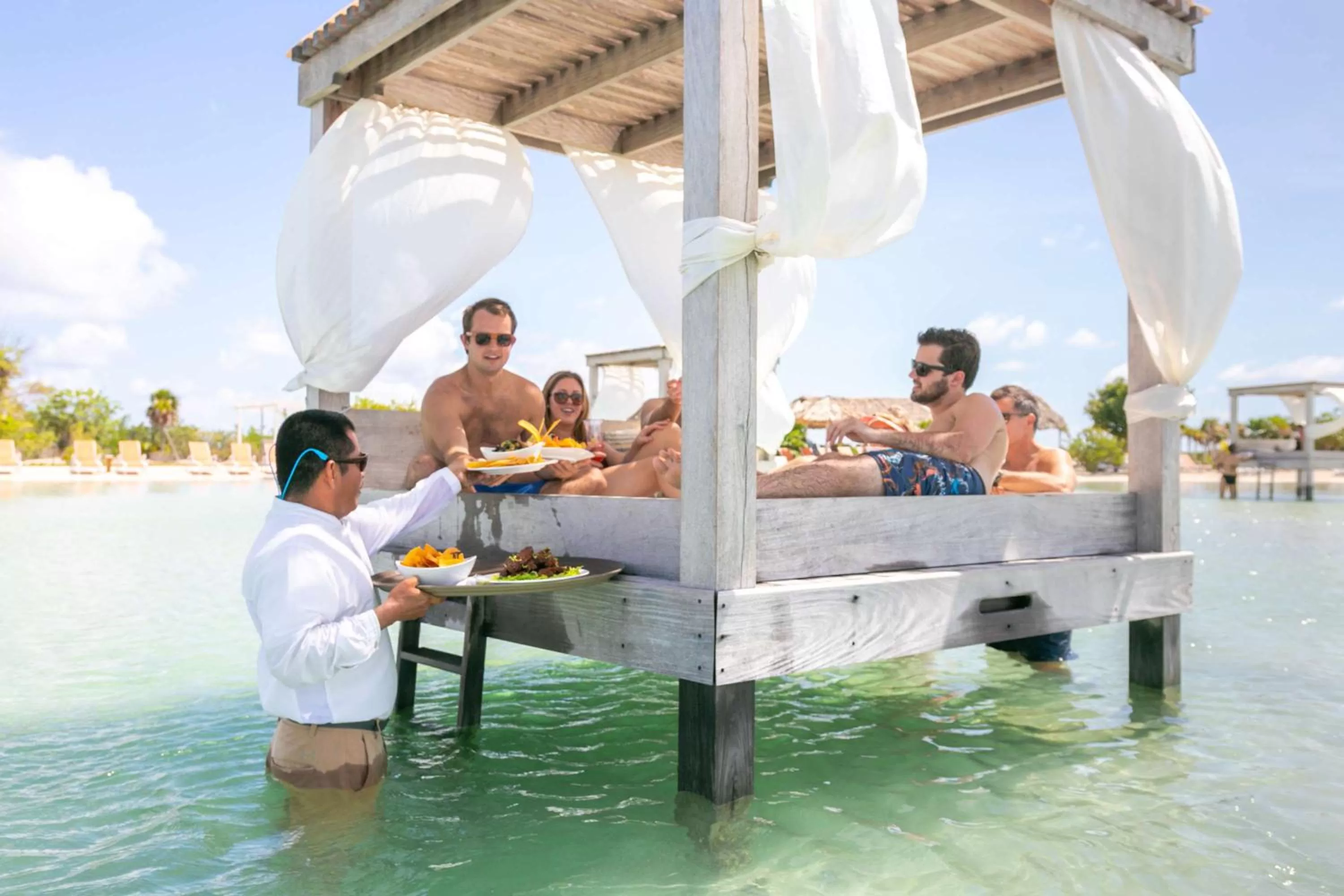 People in Mahogany Bay Resort and Beach Club, Curio Collection