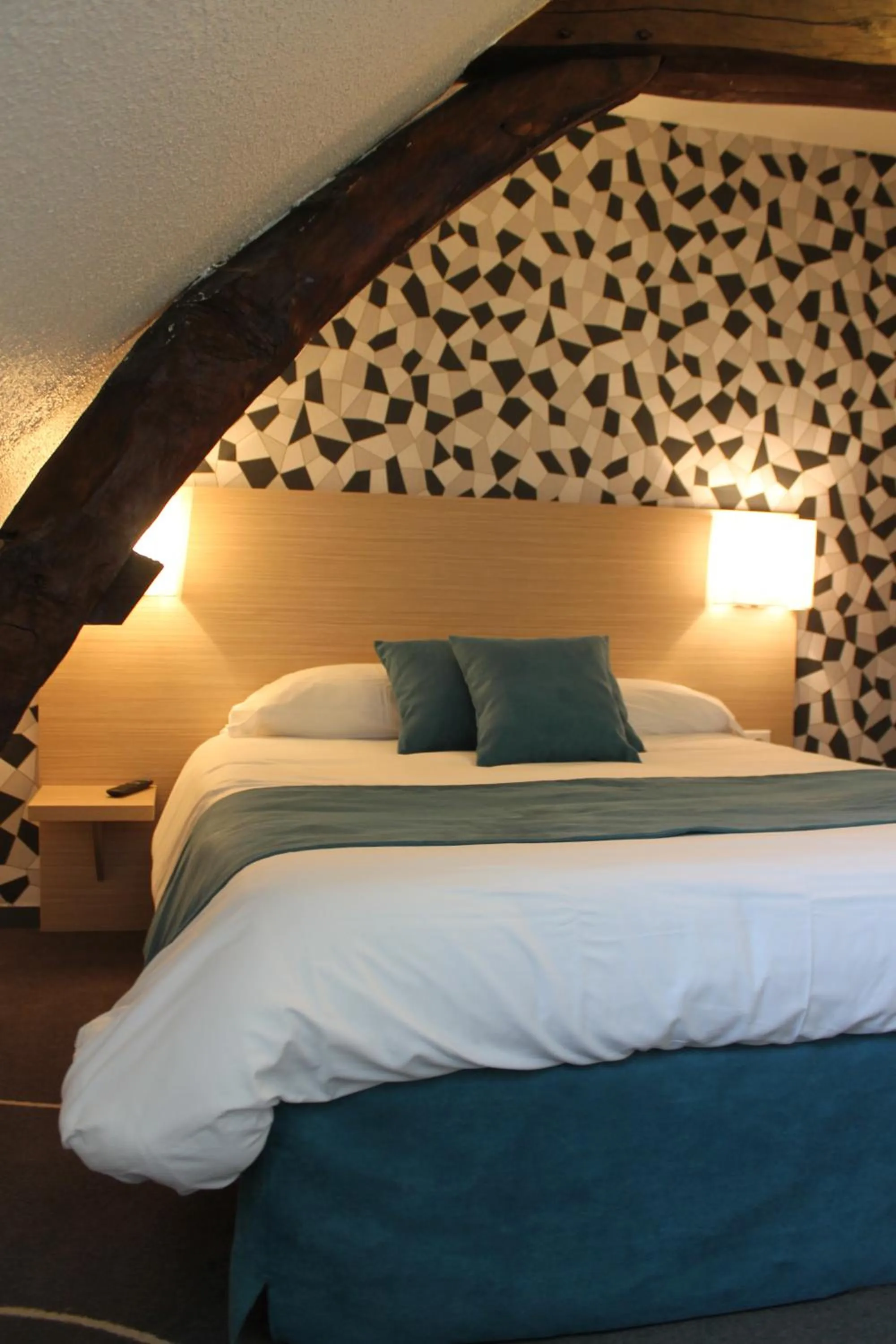 Bed in Hôtel Le Blason