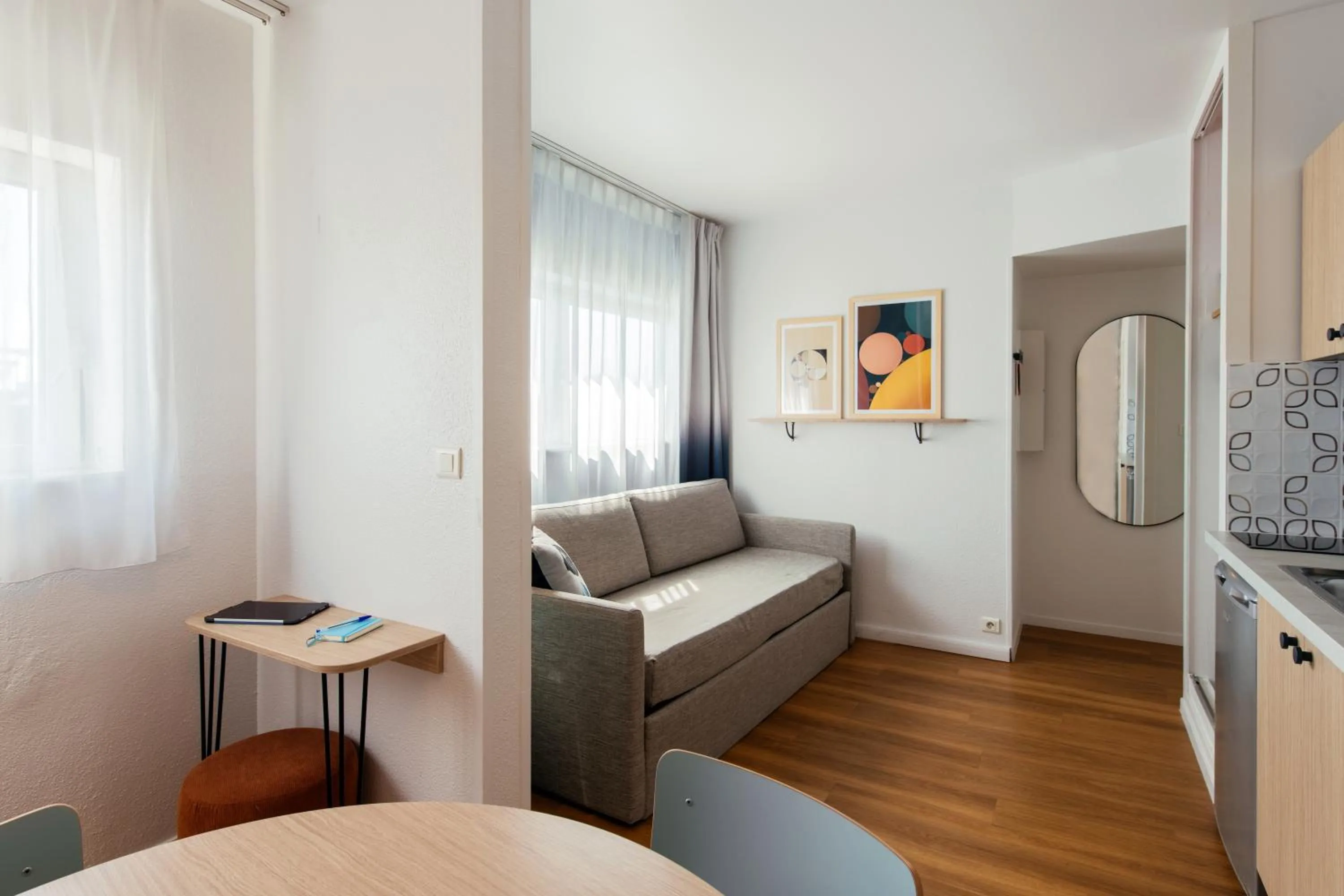 Seating area, Bed in Aparthotel Adagio Access Paris La Villette