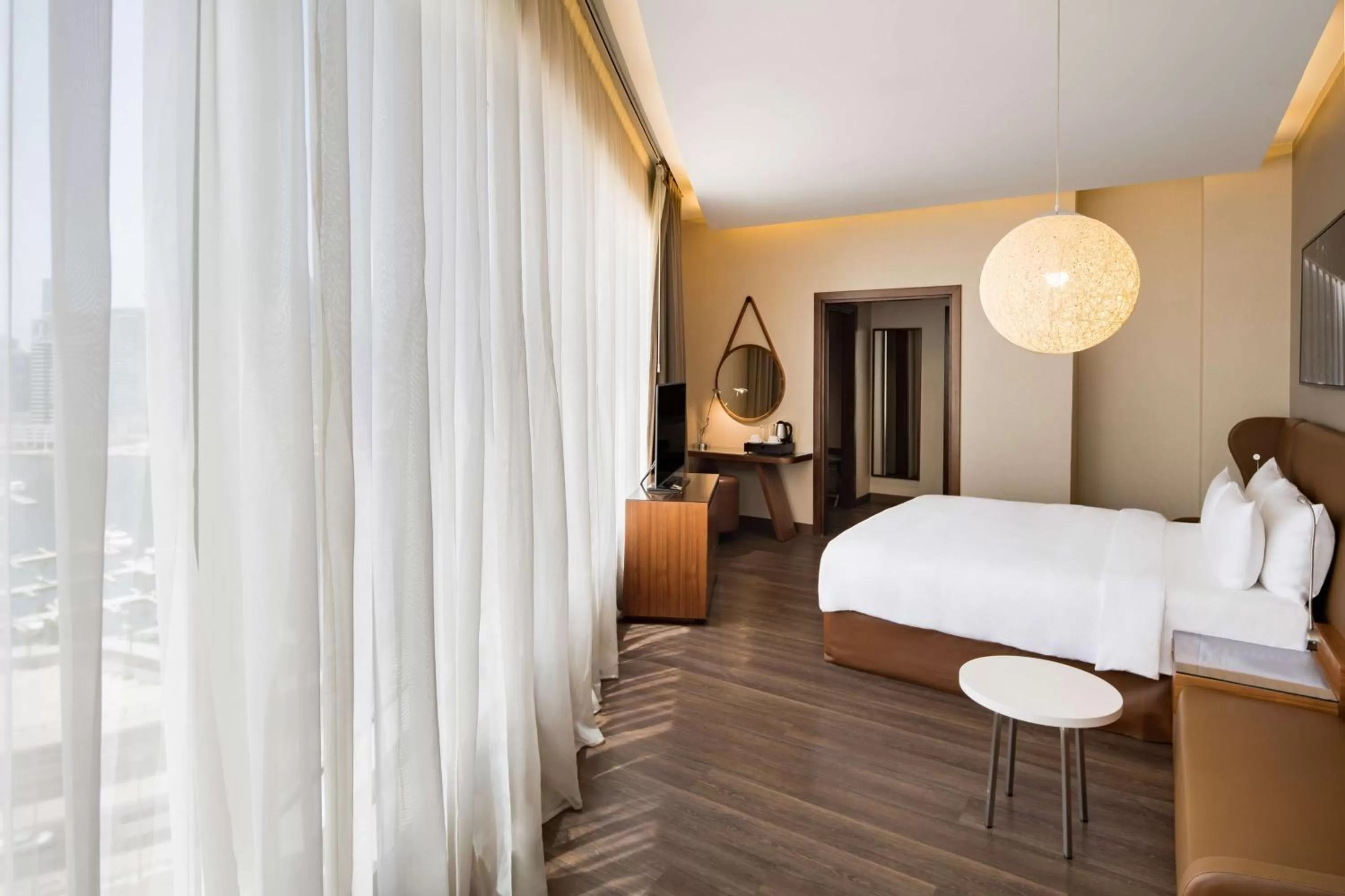 Coffee/tea facilities, Bed in Radisson Blu Hotel, Dubai Canal View