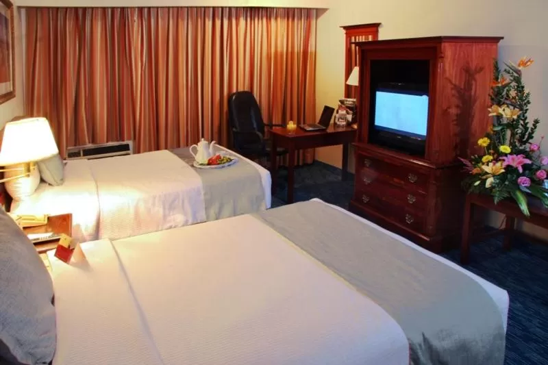 Photo of the whole room, Bed in Quality Inn & Suites Saltillo Eurotel