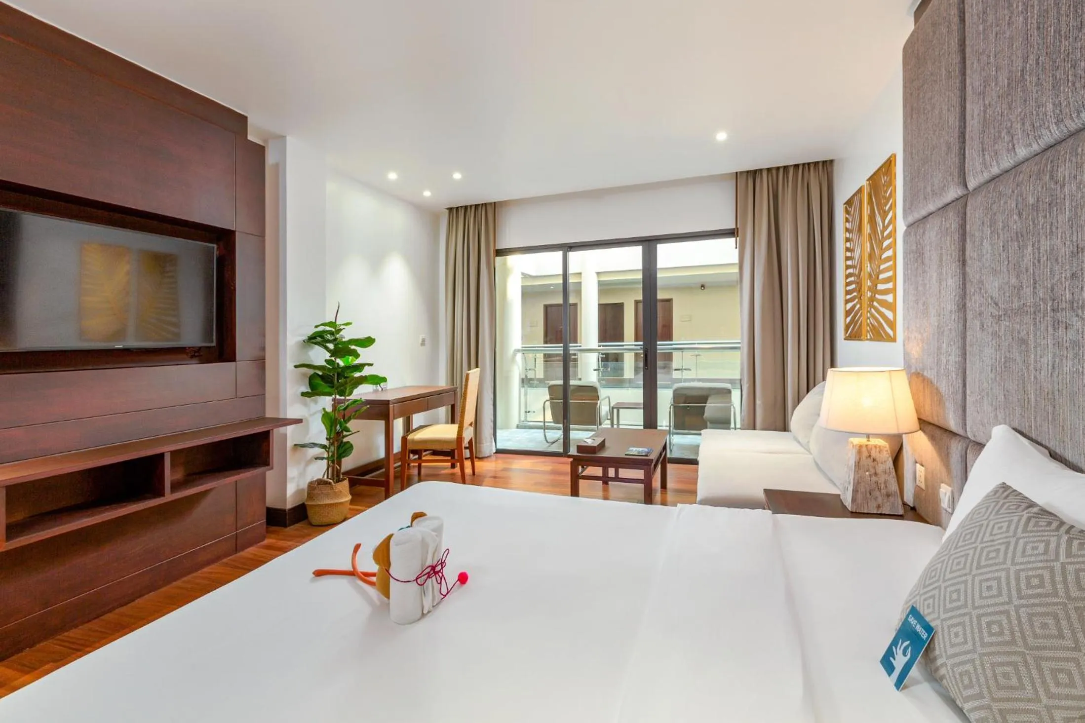 Photo of the whole room, Bed in Baan Laimai Beach Resort & Spa - SHA Extra Plus