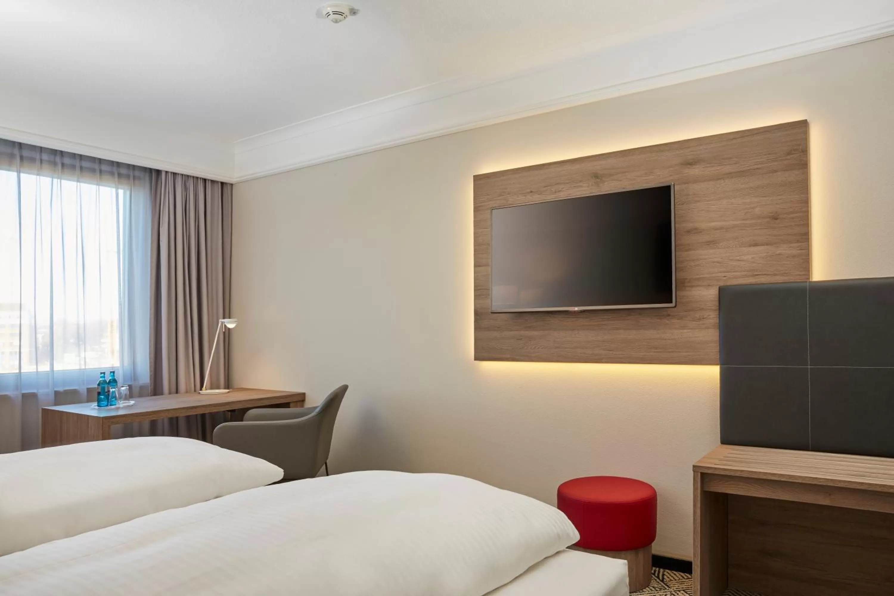 Photo of the whole room, Bed in H4 Hotel Hannover Messe, Trademark Collection by Wyndham