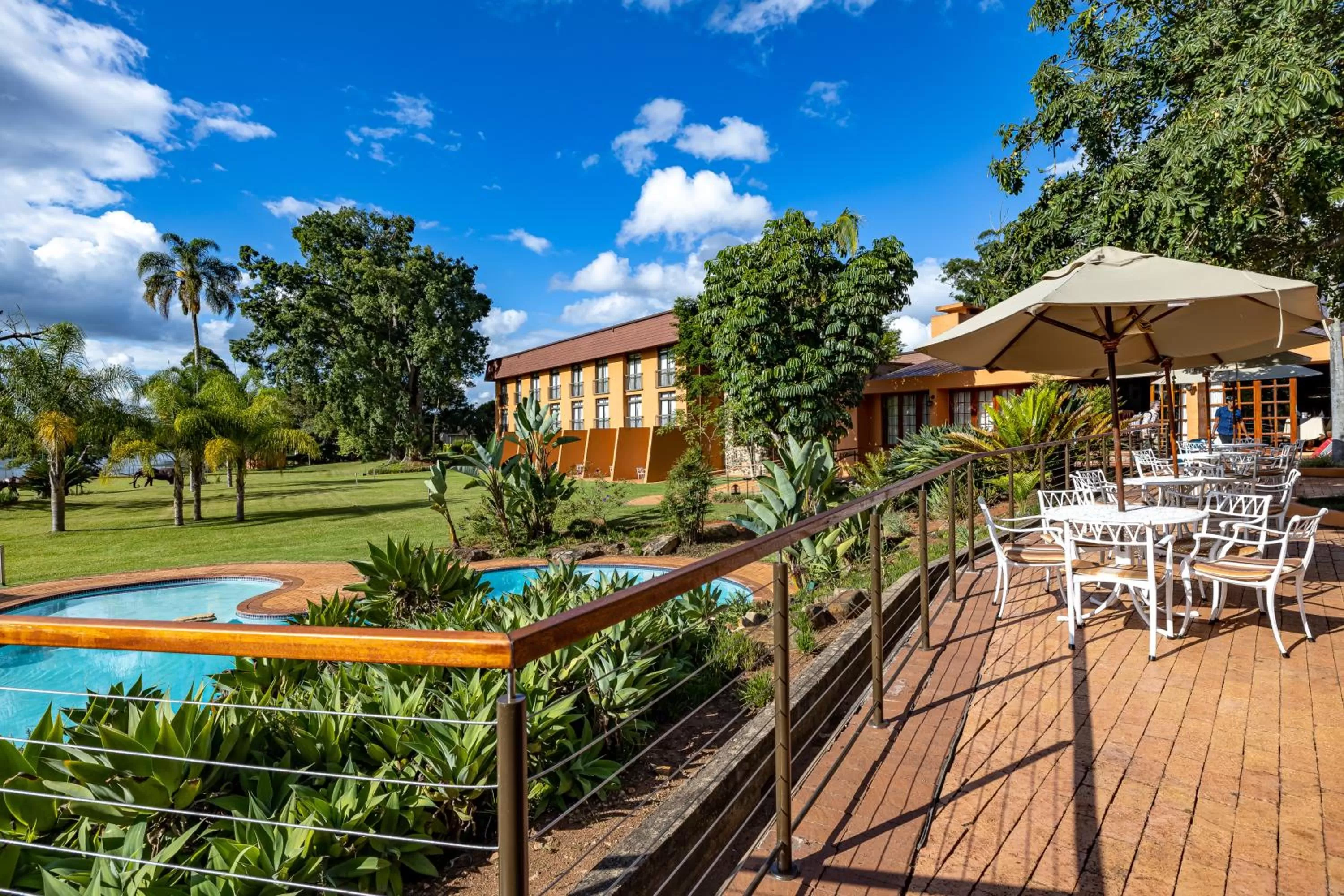 Patio in African Sky Hotels - Pine Lake Inn