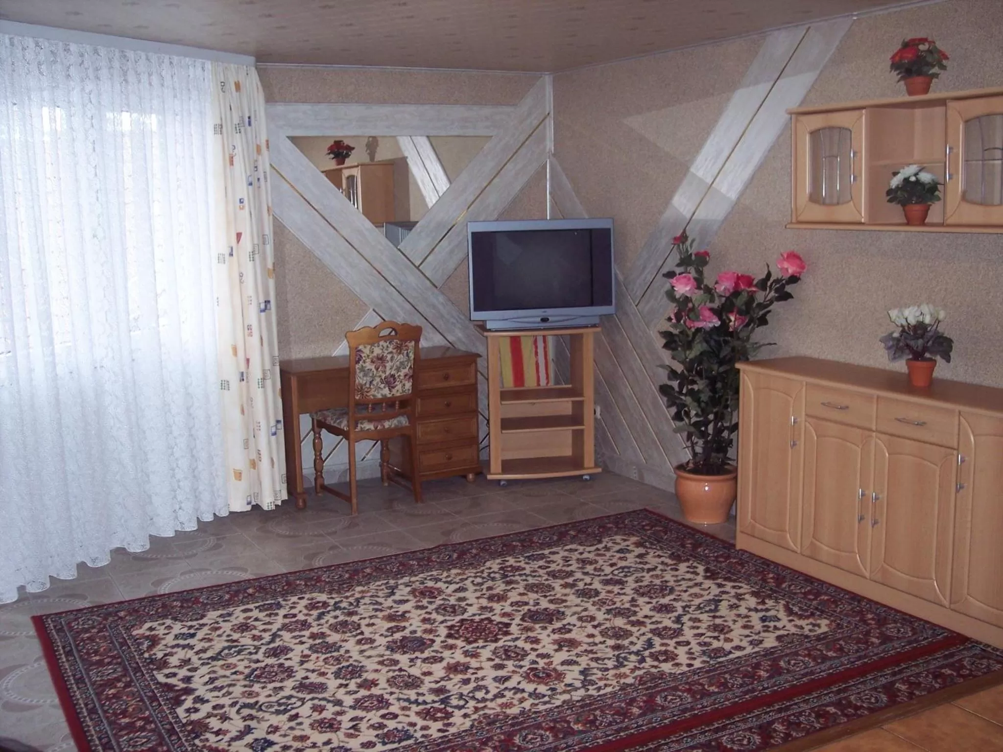 Decorative detail, TV/Entertainment Center in Central Hotel