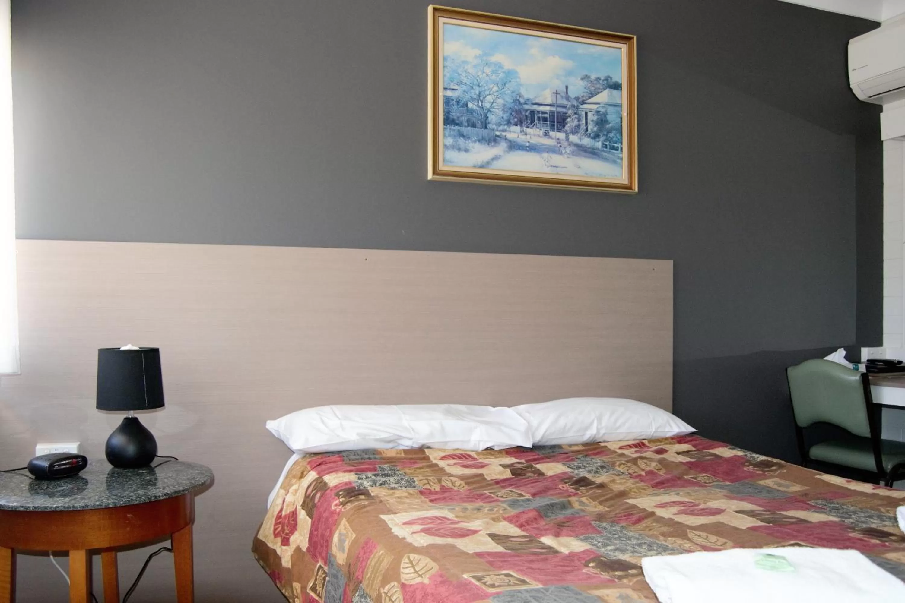 Bed in Civic Motor Inn