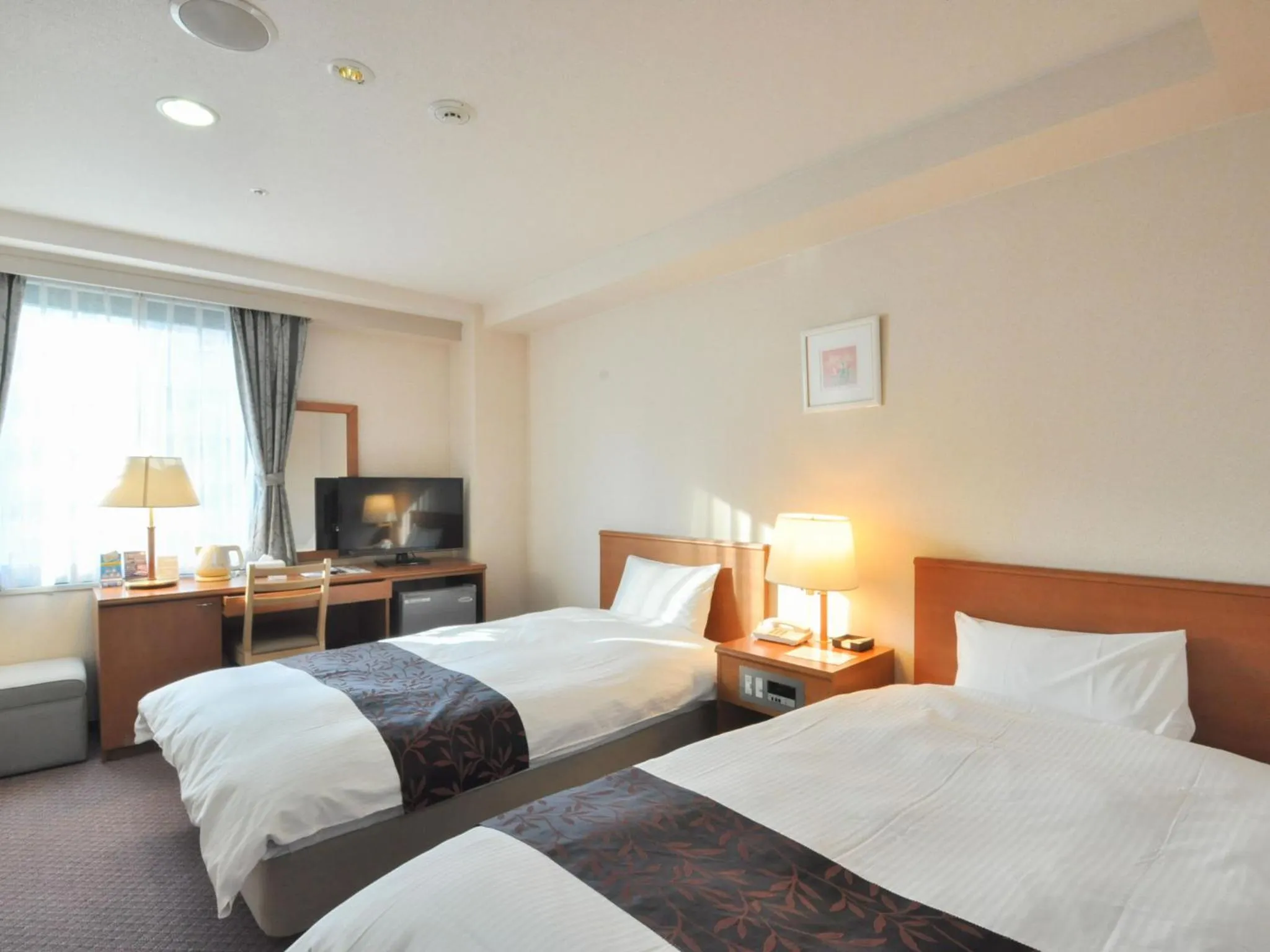 Photo of the whole room, Bed in Kobe City Gardens Hotel (Formally Hotel Kobe Shishuen)