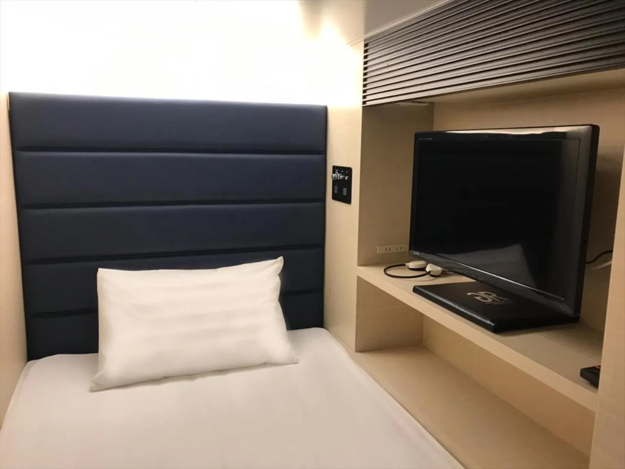 Photo of the whole room, Bed in Green Rich Hotel & Capsule Naha - Artificial hot spring Futamata Yunohana