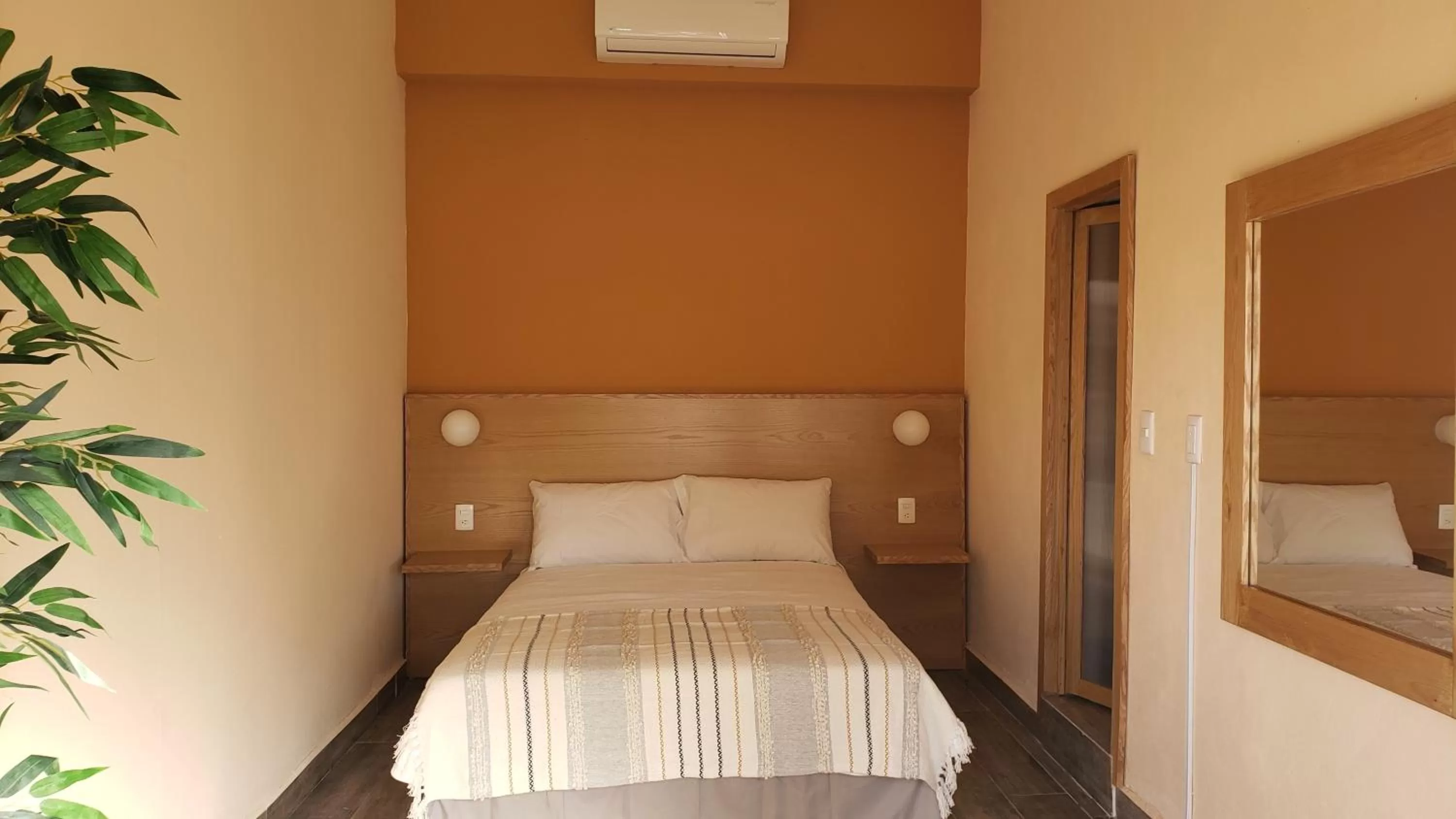 Bed in Hotel Grand Isitia