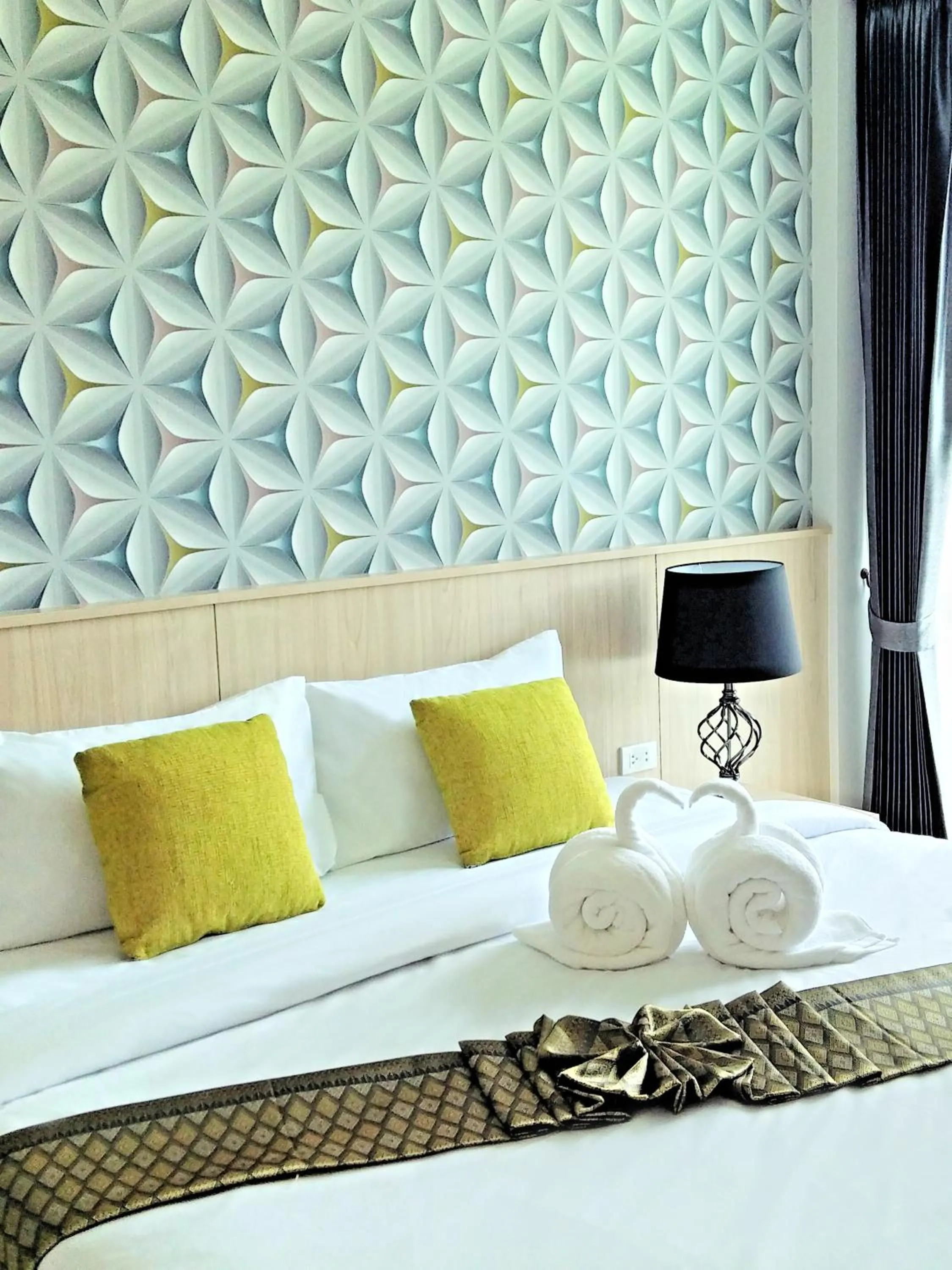 Bed in The Wings Boutique Hotels Krabi Ko Lanta