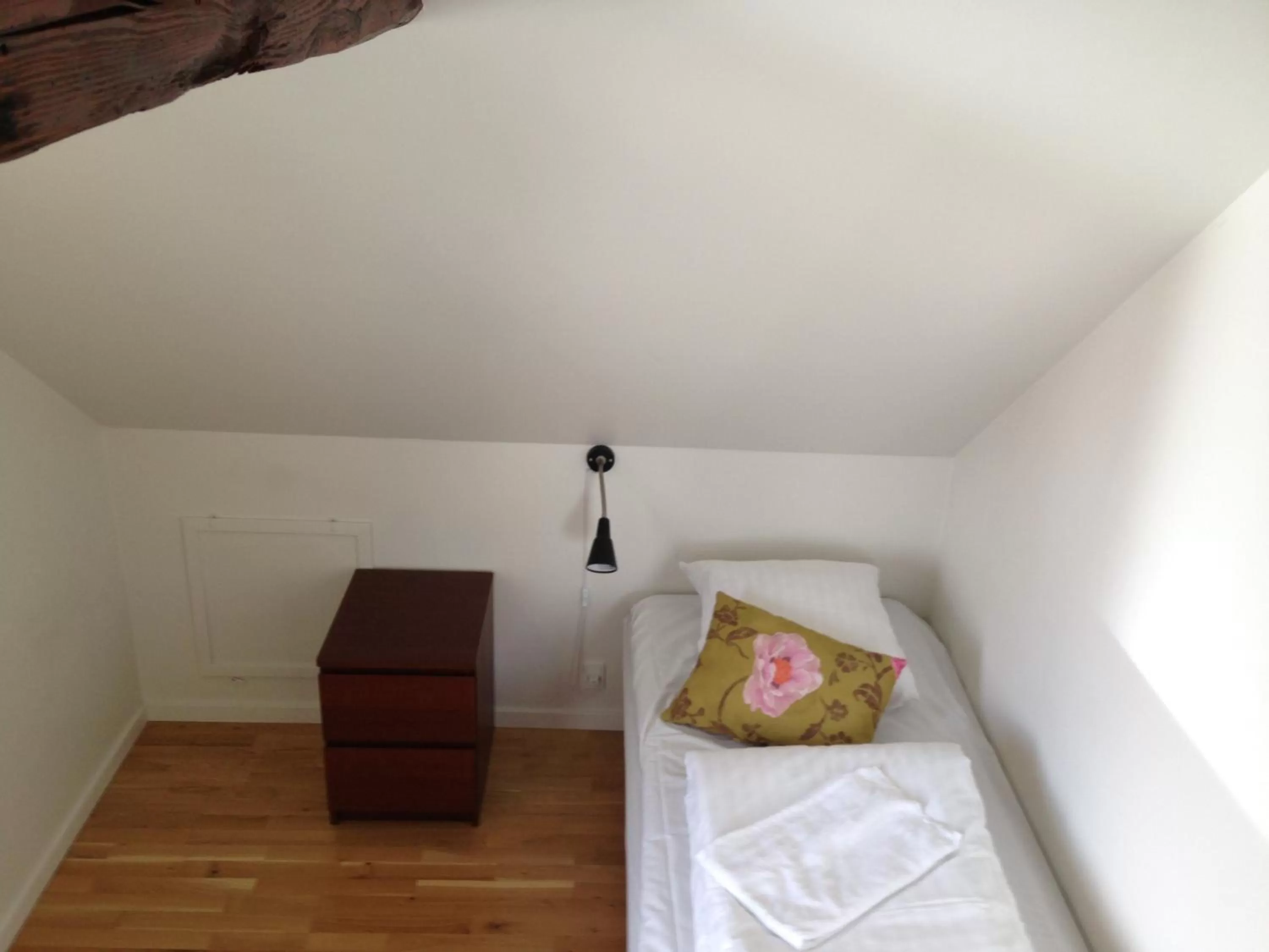 Decorative detail, Bed in Kirke Saaby Forsamlingshus