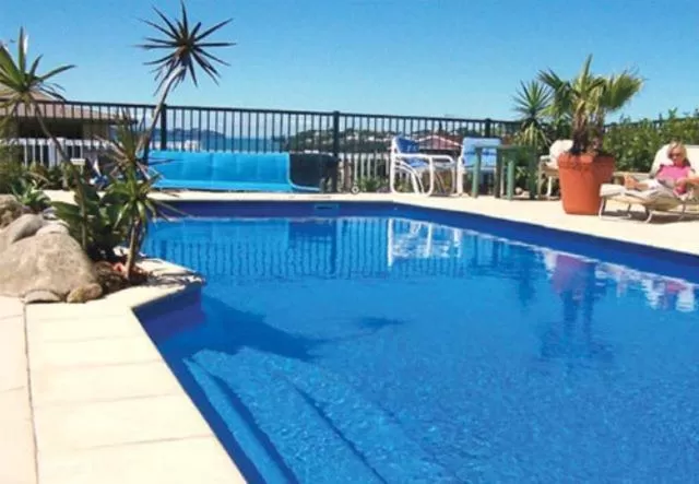 Swimming pool in Snells Beach Motel