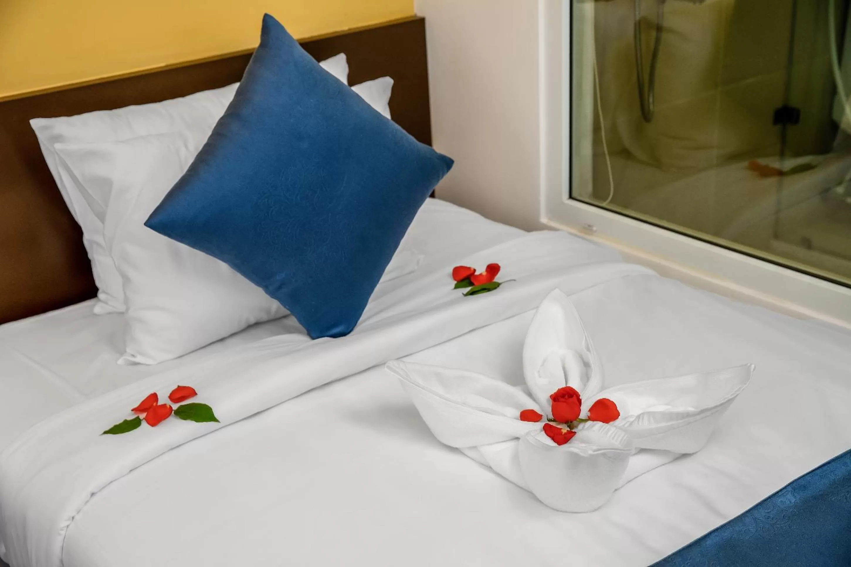 Decorative detail, Bed in TRIPLE Riverside Villa Hotel HoiAn