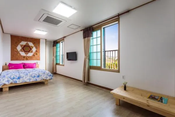 Bed in Jeju Wayo Pension