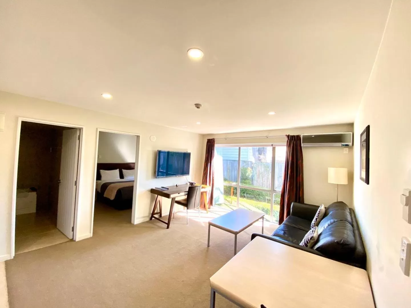 Living room in Alpha Motel with Spa-Bath