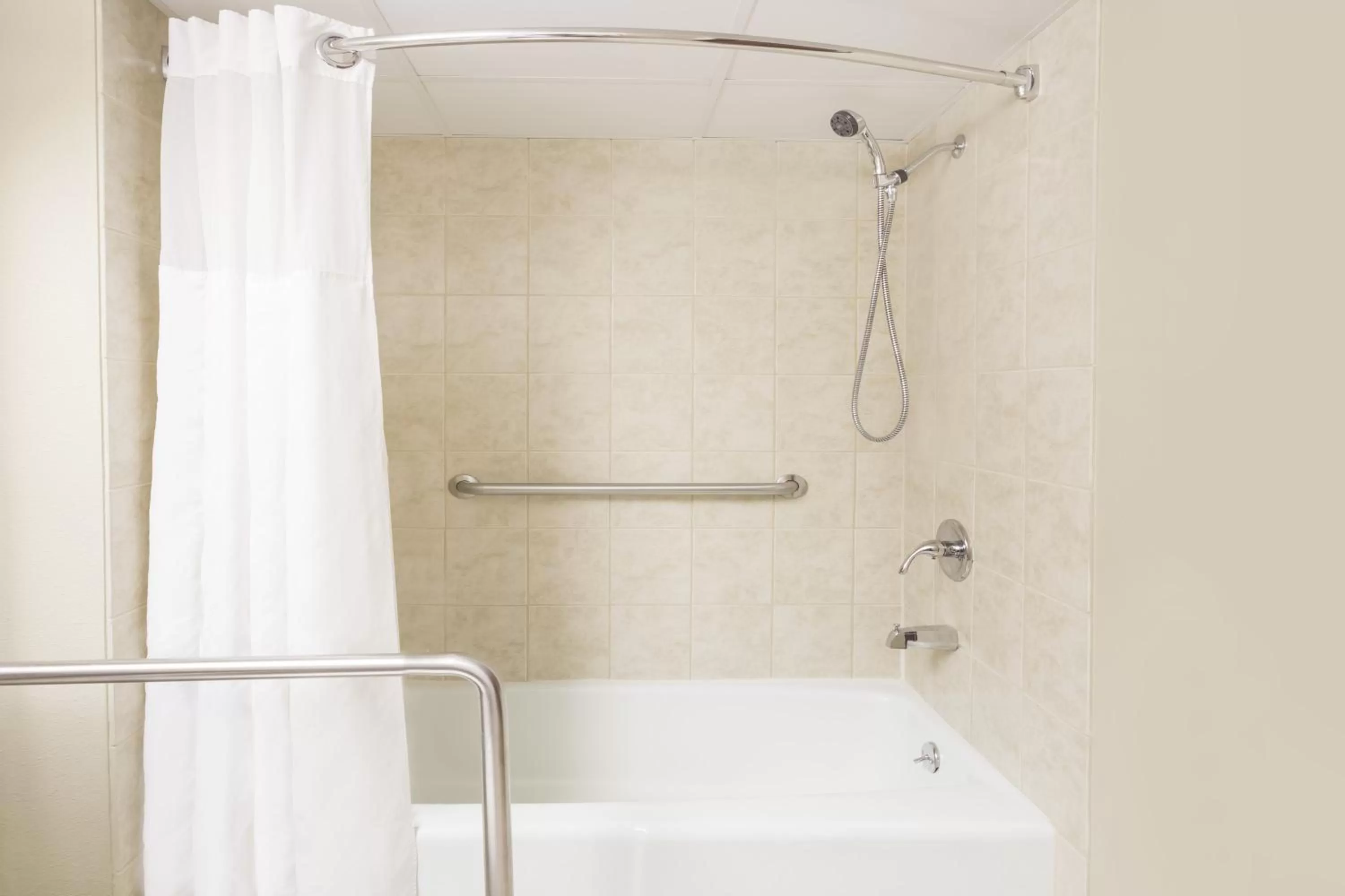 Bathroom in AmericInn by Wyndham Janesville