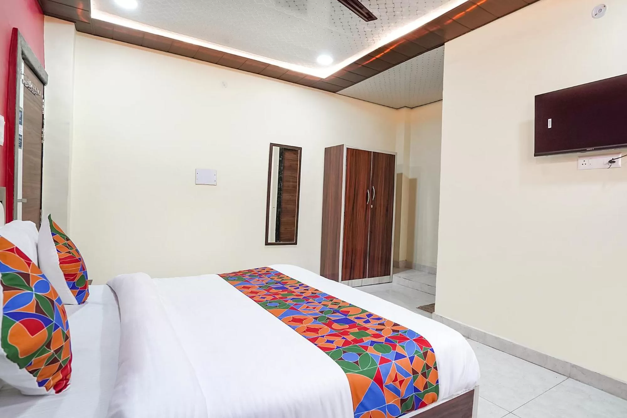 Bed in FabHotel Rajdhani