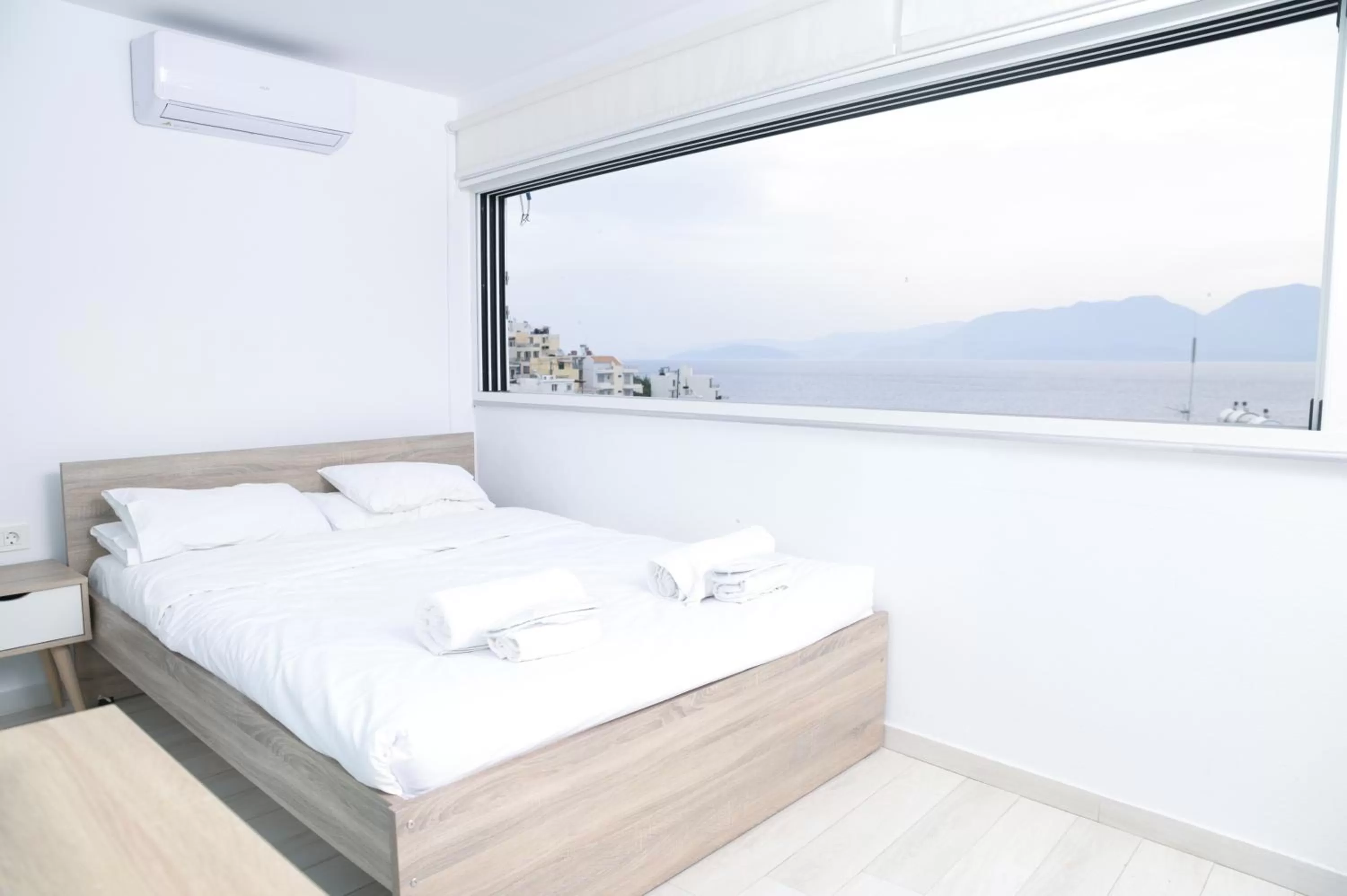 Bed in Ikaros Art Hotel