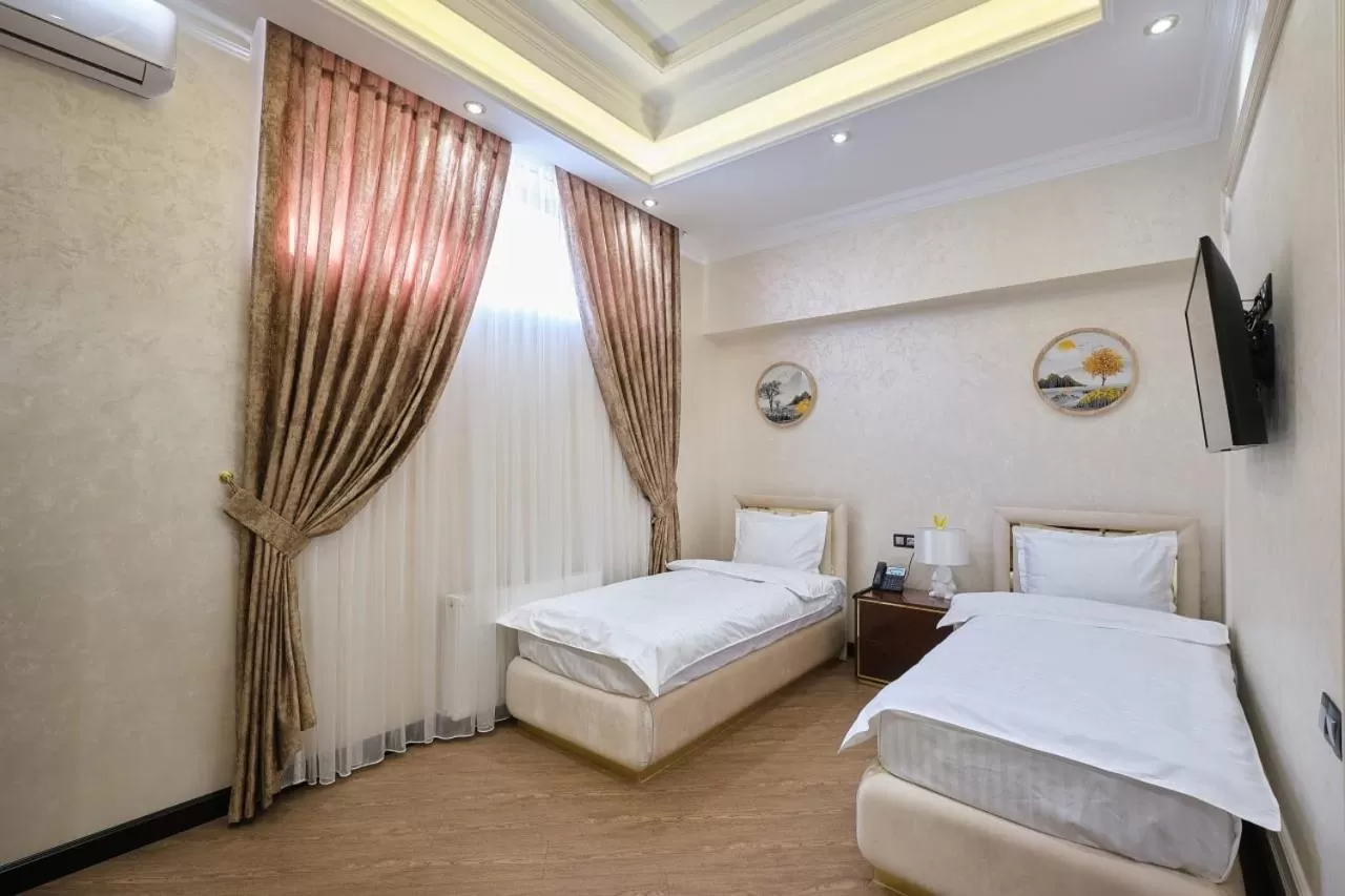 Bed in East Star Hotel