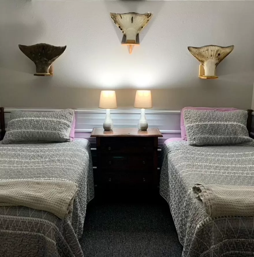 Bed in Clam Gulch Lodge