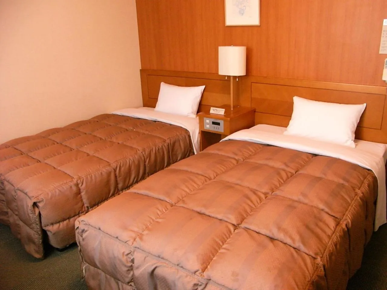 Bed in Hotel Route-Inn Aso Kumamoto Airport Ekimae